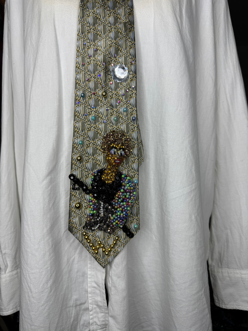 Beige Whitney Houston in Colorful Gem Jacket Posing on Staircase Tie