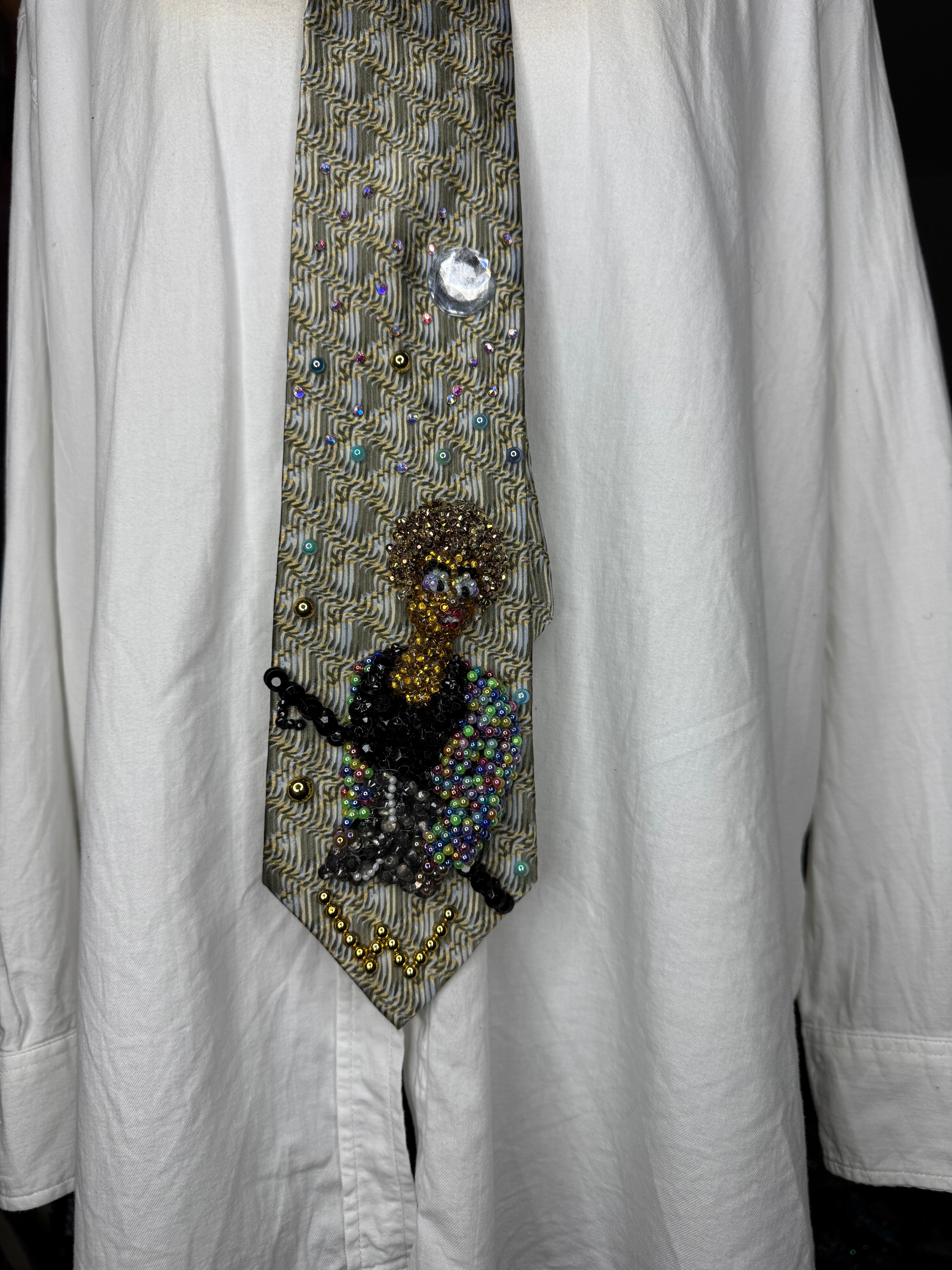 Beige Whitney Houston in Colorful Gem Jacket Posing on Staircase Tie