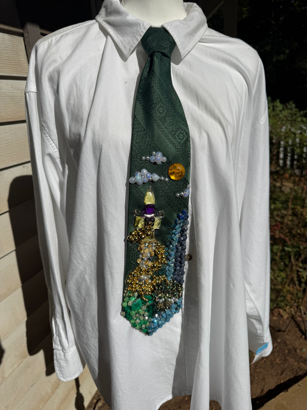 Dark Green Rapunzel Hair Twirling Around Castle Movie Tie
