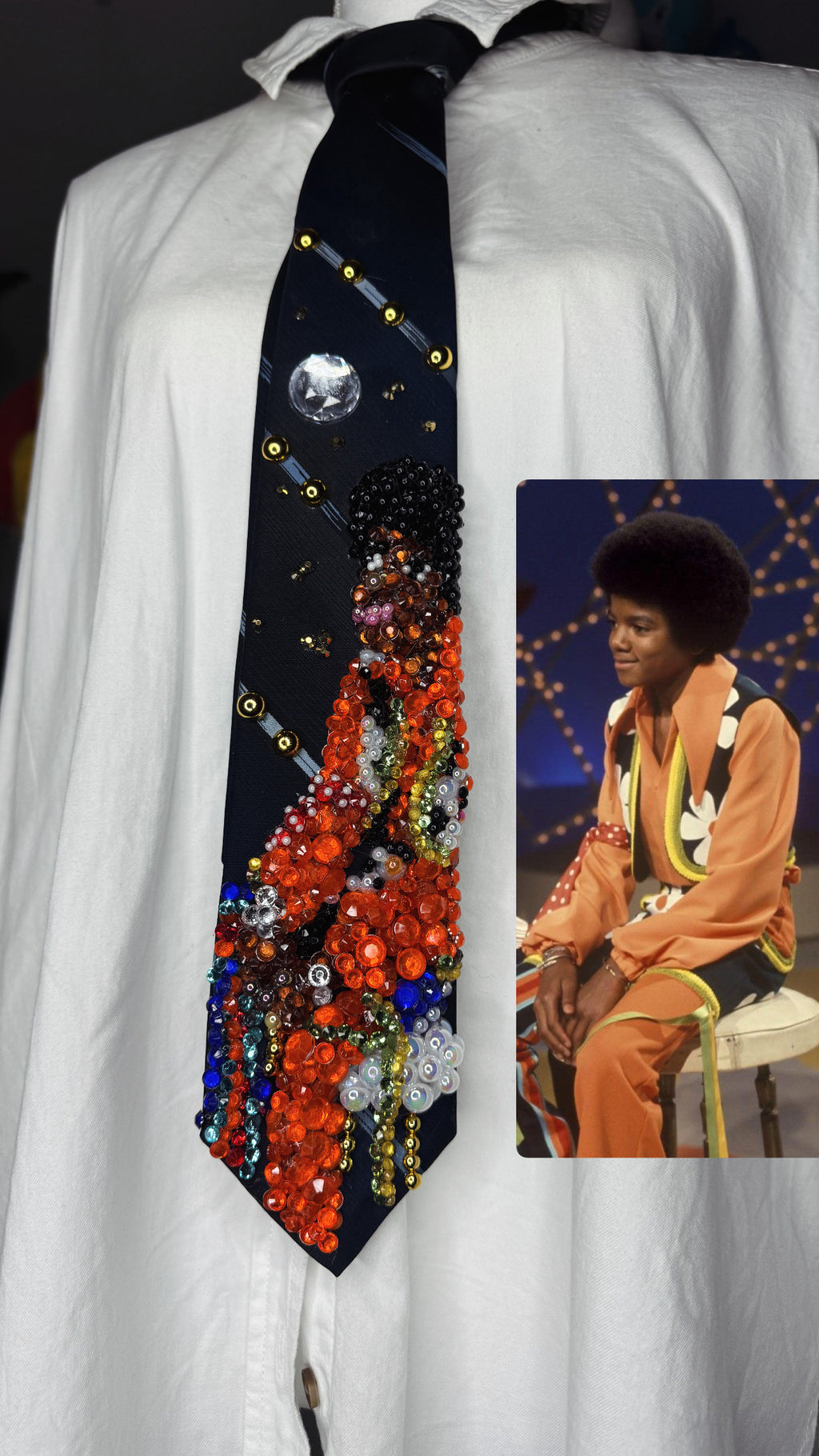 Navy Blue Young Michael Jackson In Orange and Floral Vest Outfit on White Chair 1972 Tie