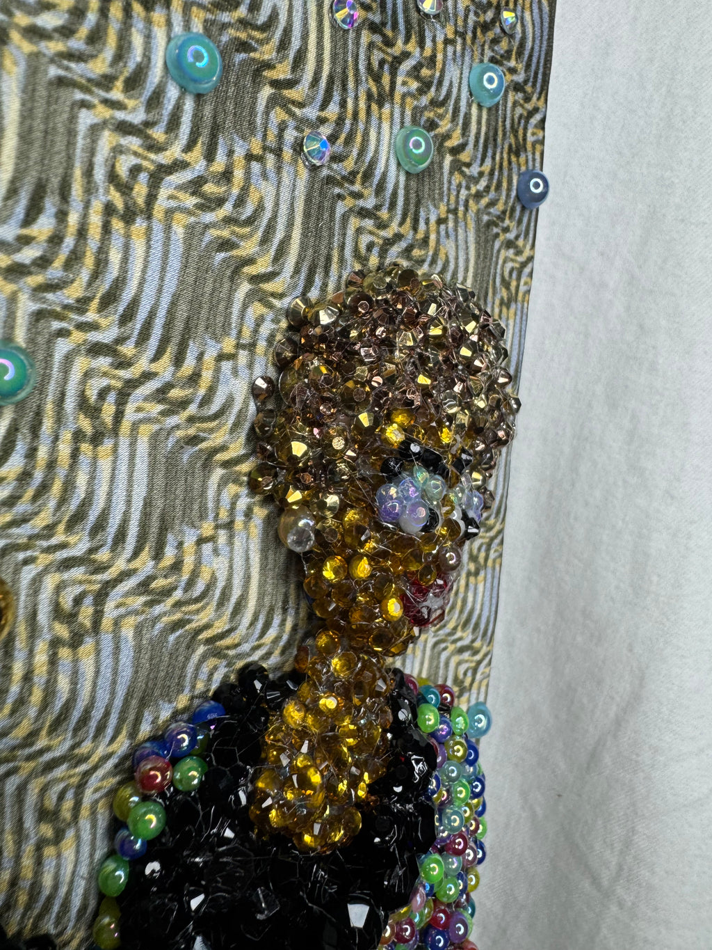 Beige Whitney Houston in Colorful Gem Jacket Posing on Staircase Tie