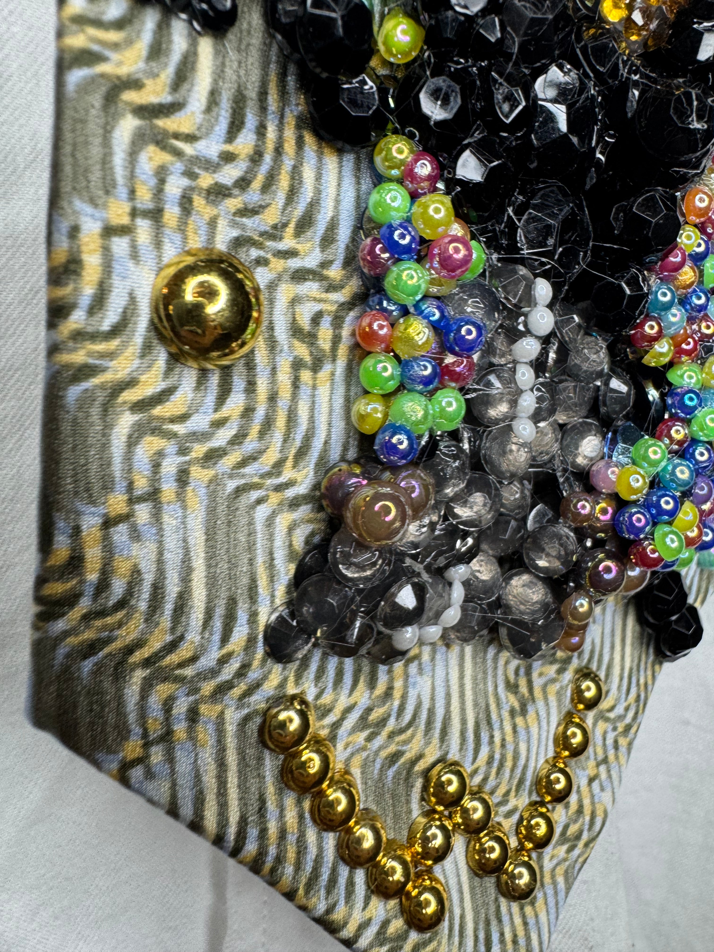 Beige Whitney Houston in Colorful Gem Jacket Posing on Staircase Tie