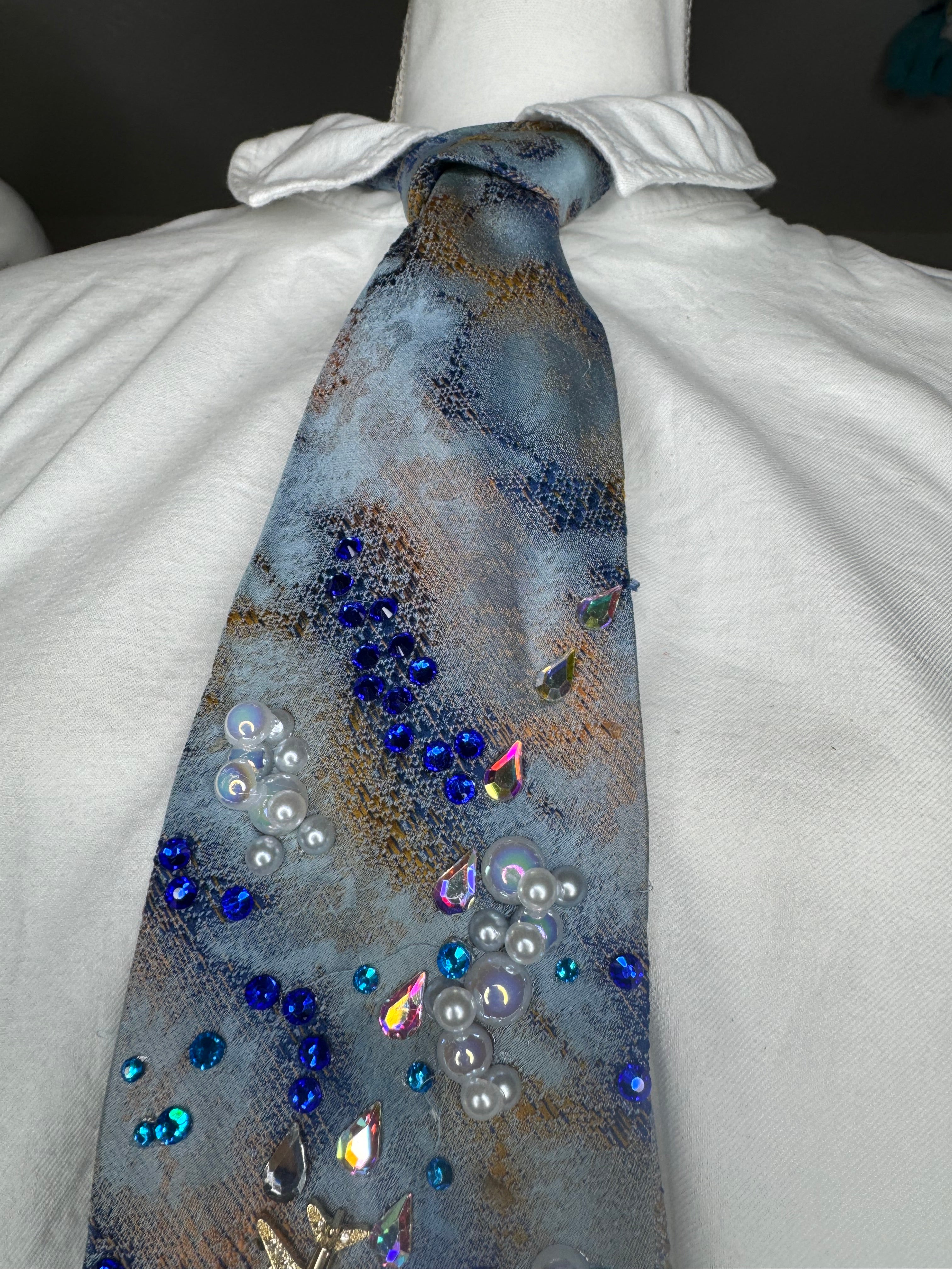 Blue and Orange Clouds and Airplanes Over Water Pilot Tie