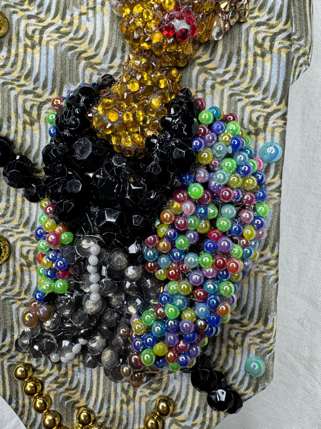 Beige Whitney Houston in Colorful Gem Jacket Posing on Staircase Tie