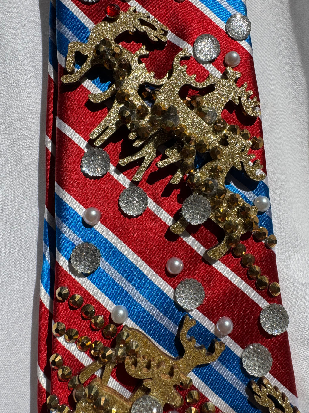 Red and Blue Striped Rudolf and the Reindeers Sleighing By Christmas Tie