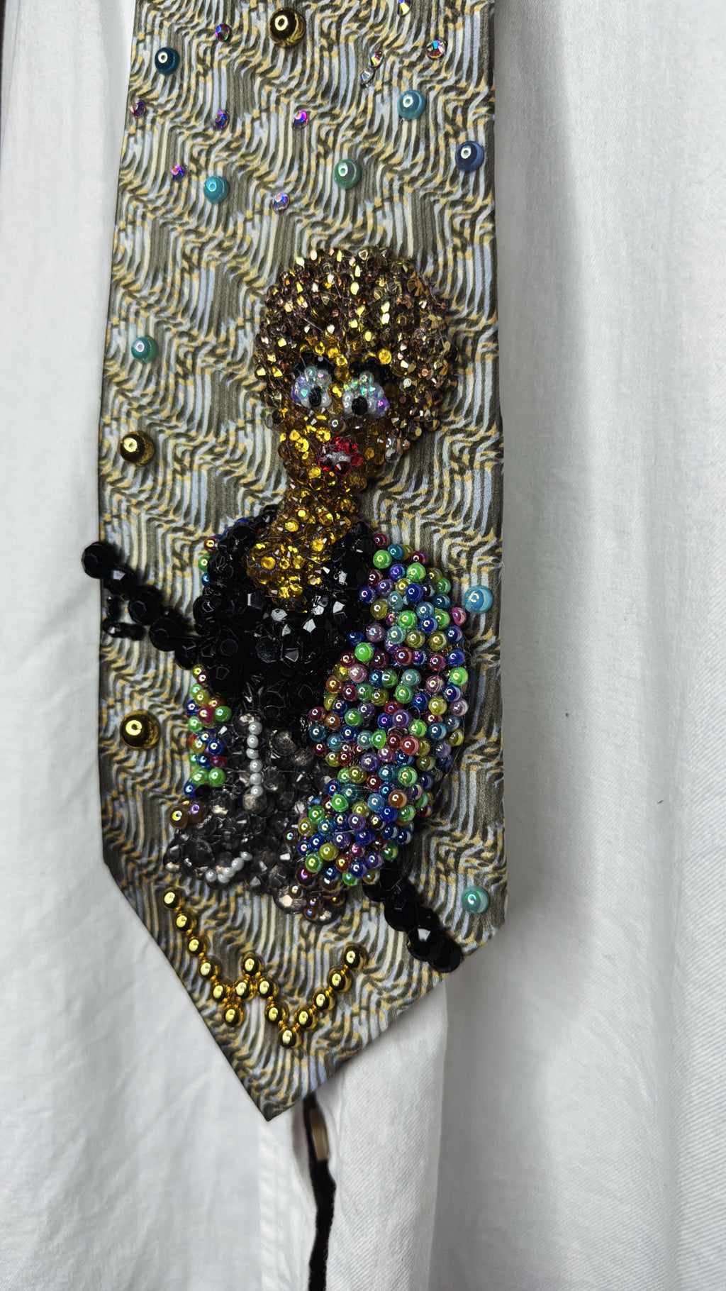 Beige Whitney Houston in Colorful Gem Jacket Posing on Staircase Tie
