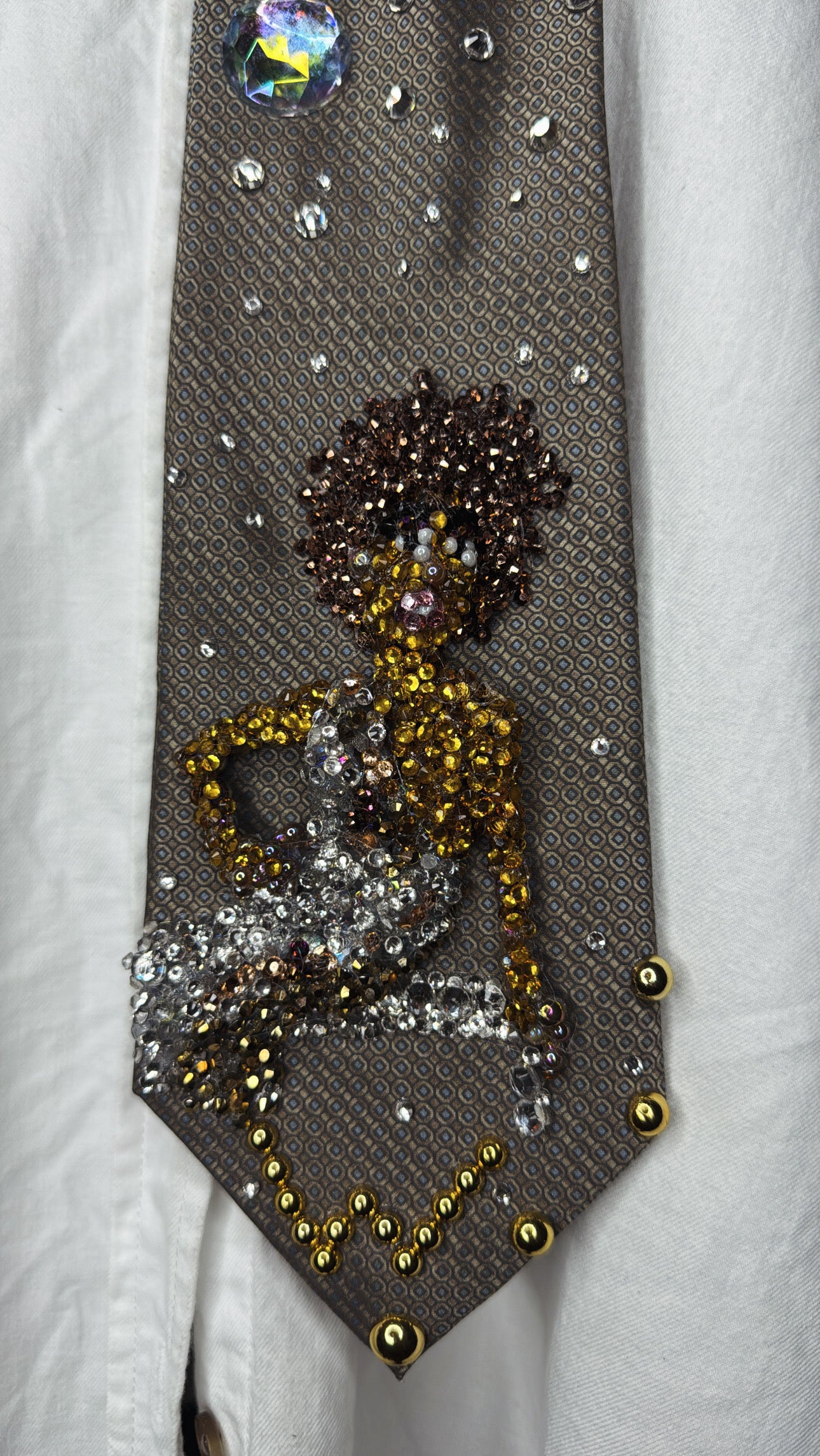 Brown Whitney Houston Posing on Clear Bench in Crystal Royalty Open Shoulder Dress For Photoshoot Tie