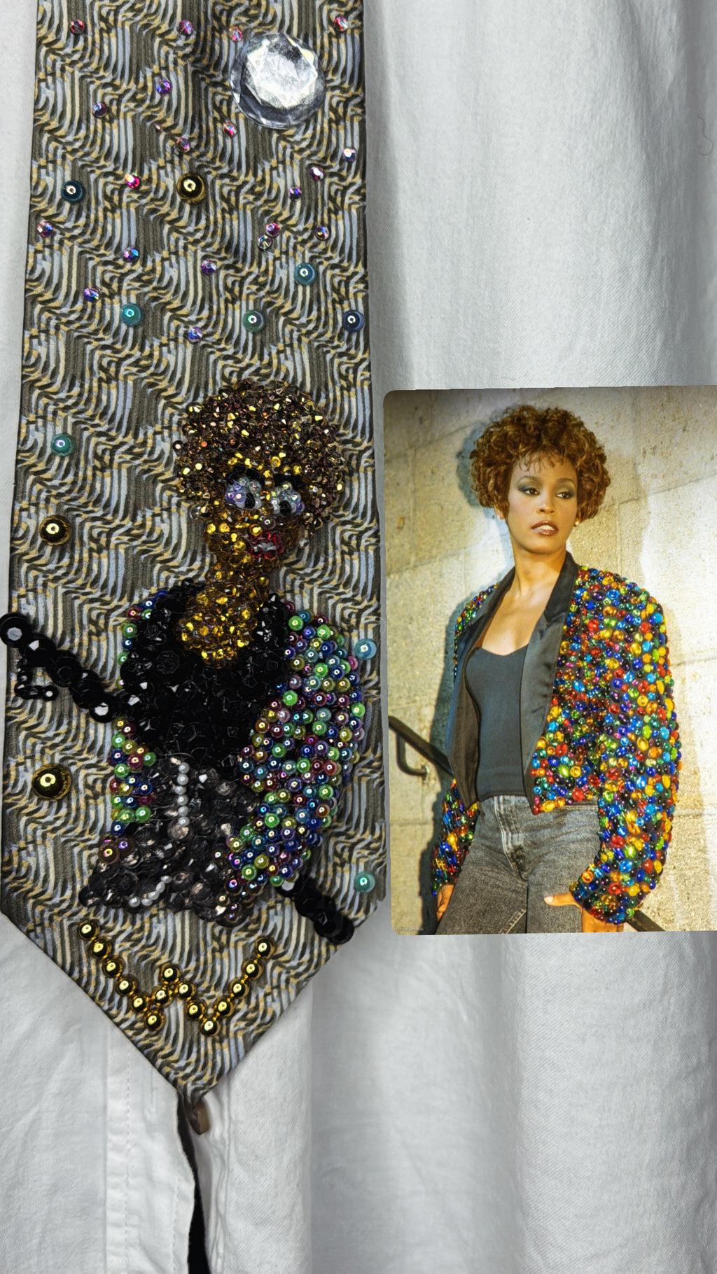 Beige Whitney Houston in Colorful Gem Jacket Posing on Staircase Tie
