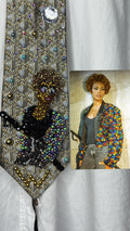 Beige Whitney Houston in Colorful Gem Jacket Posing on Staircase Tie