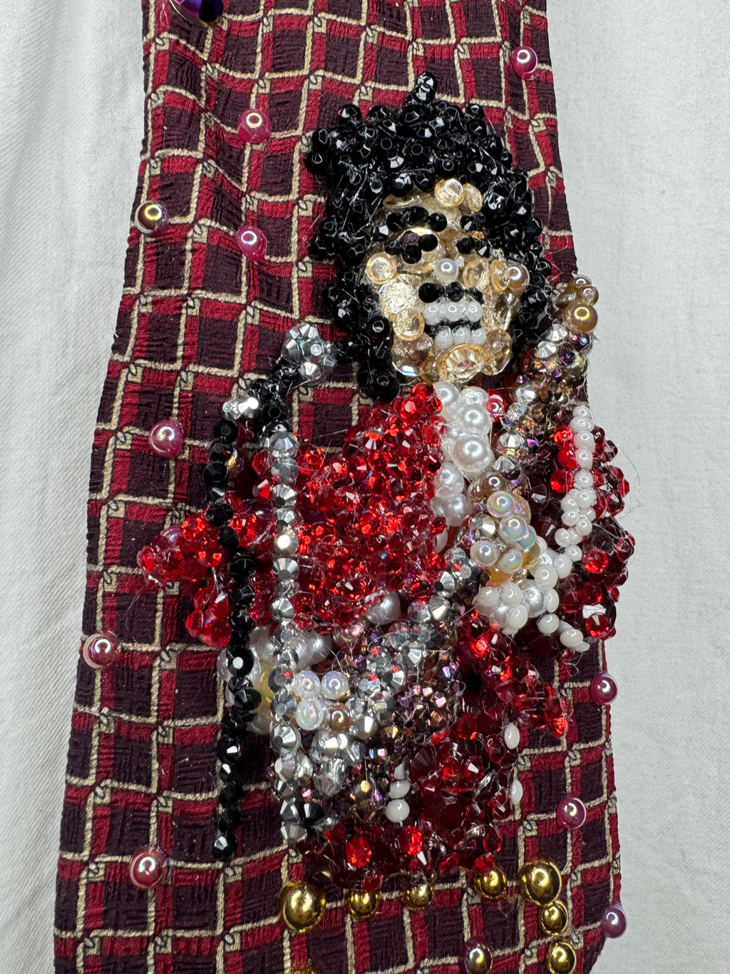 Red Prince Rocking Out in Red Outfit with Red Fuzzy Scarf on Brown Guitar Live Tie