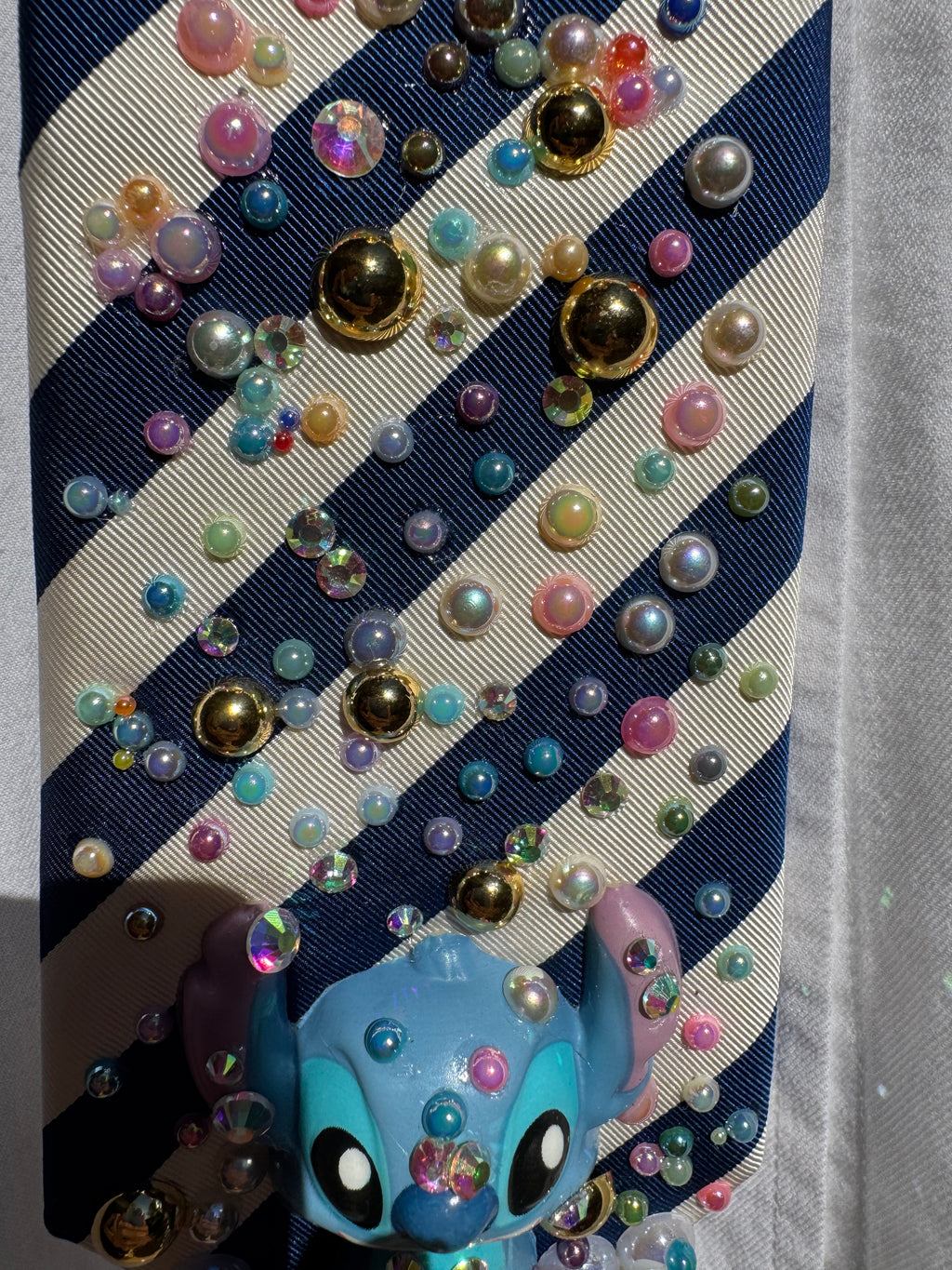 White and Blue Striped Stitch Under Cotton Candy Balls Treasure Box Spilling Movie Tie