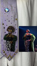 Purple Whitney Houston Performing In Black Floral Pants And Green Mink Coat Tie