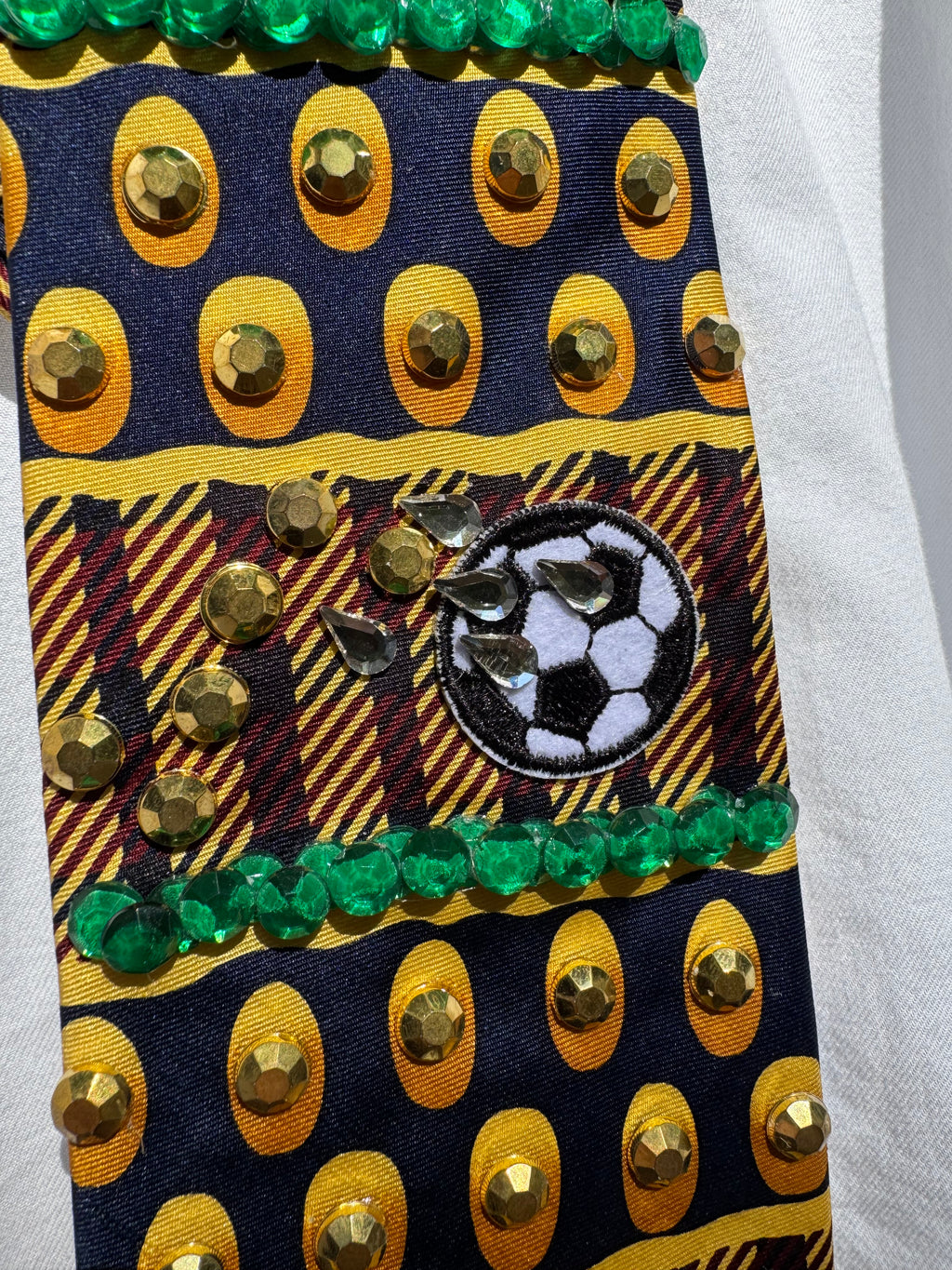 Gold and Burgundy Soccer Balls Moving Soccer Tie