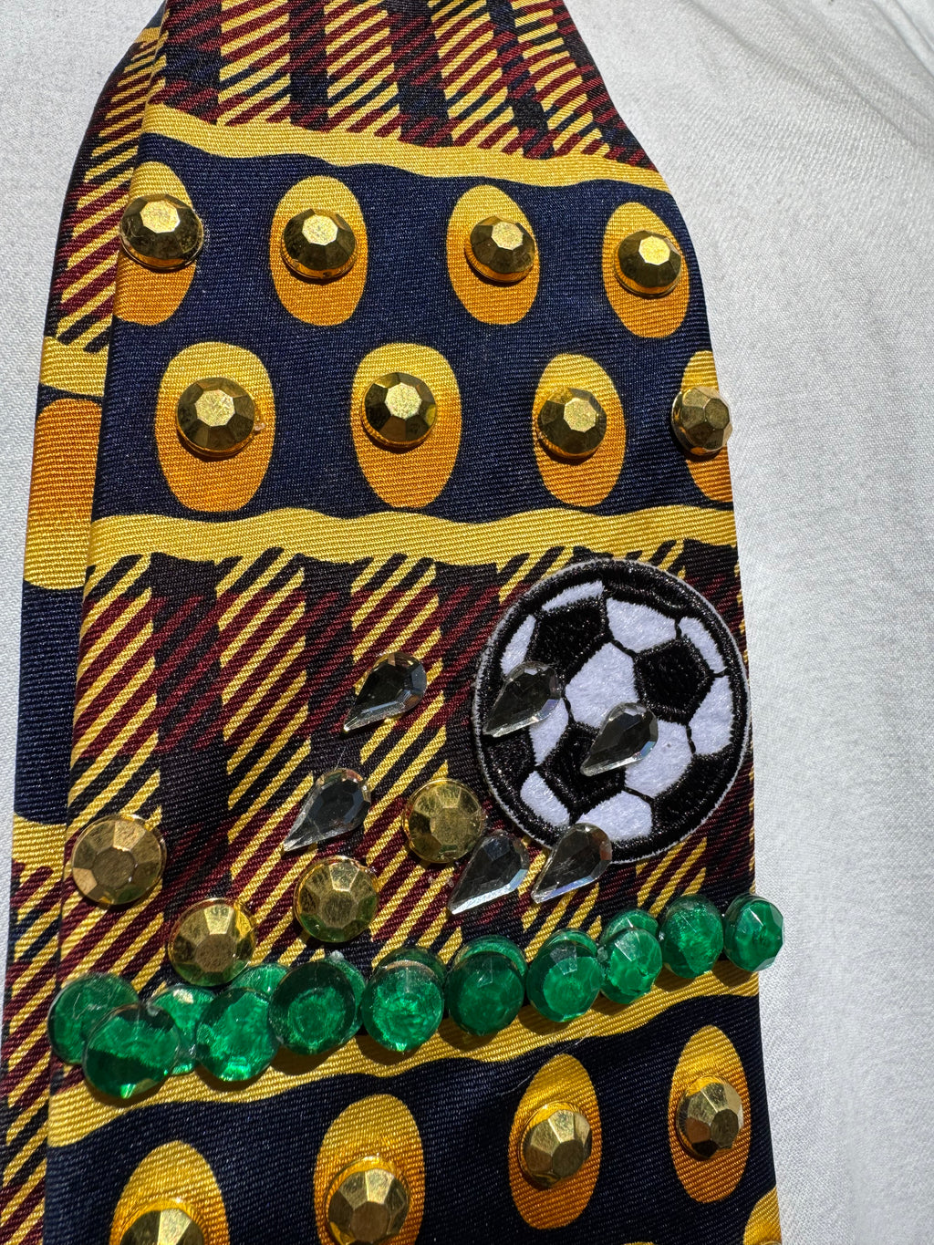 Gold and Burgundy Soccer Balls Moving Soccer Tie