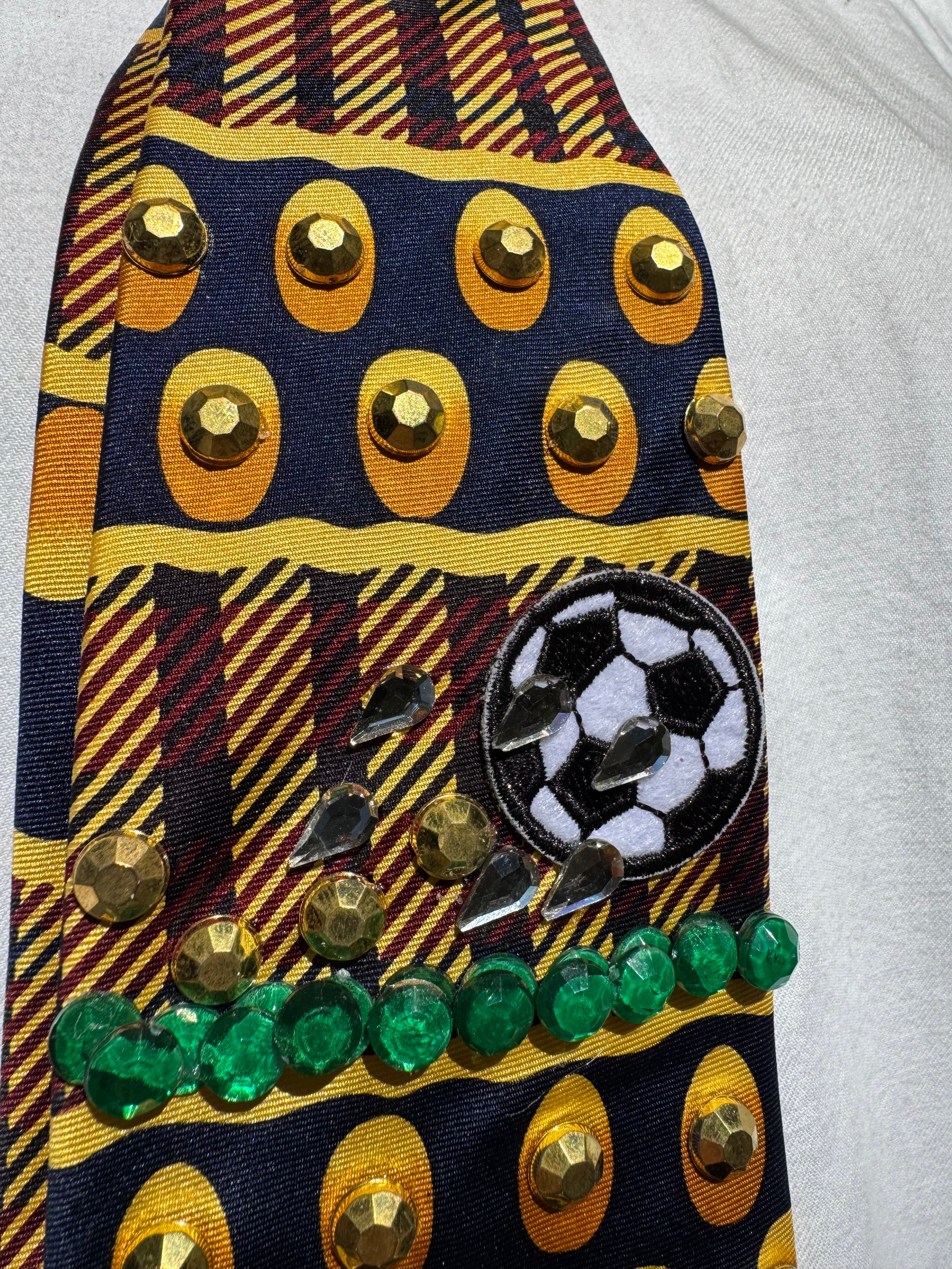 Gold and Burgundy Soccer Balls Moving Soccer Tie