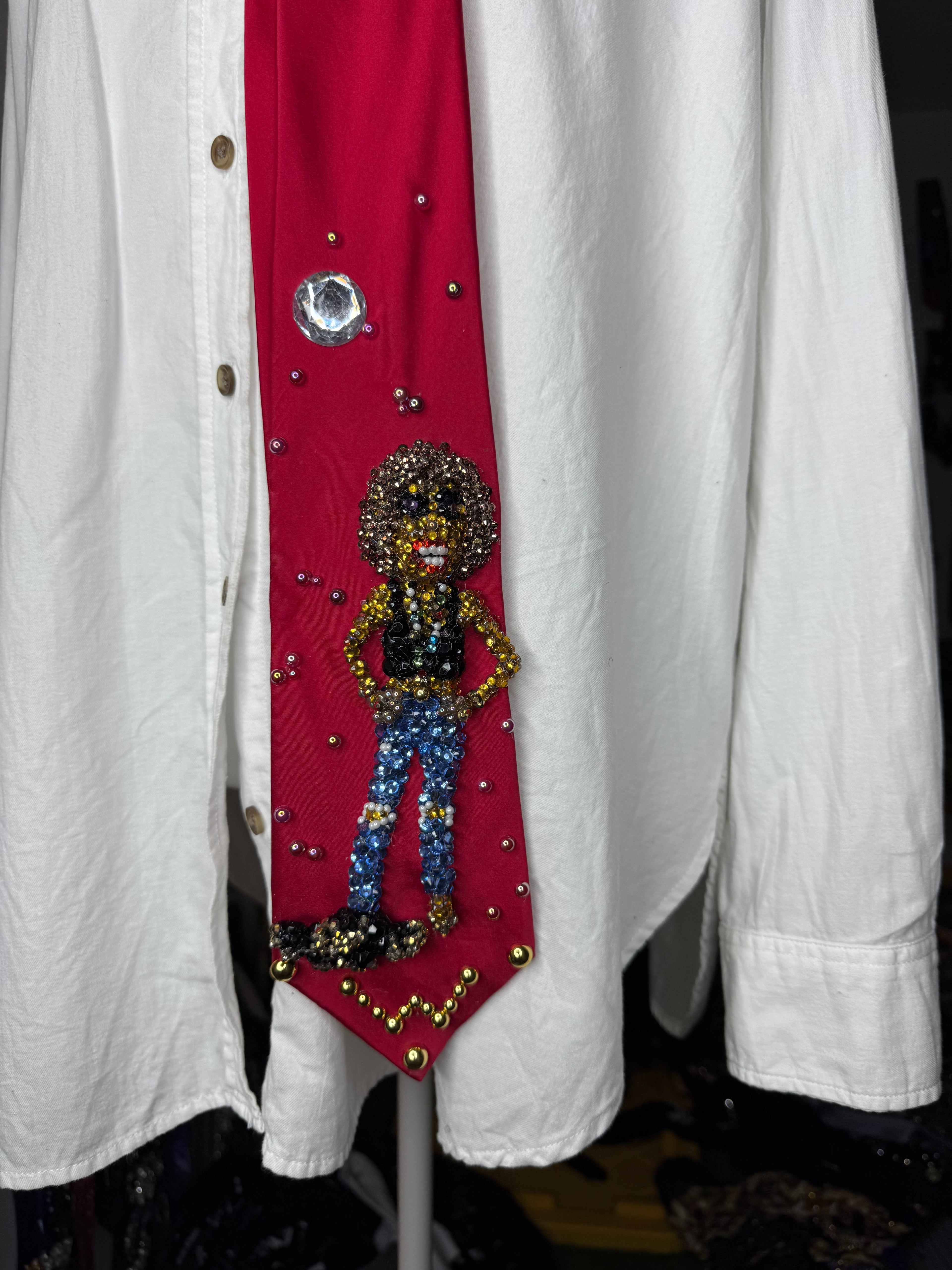 Red silk Whitney Houston with Hands Hip, Smiling with Jacket on Floor Photo shoot Tie