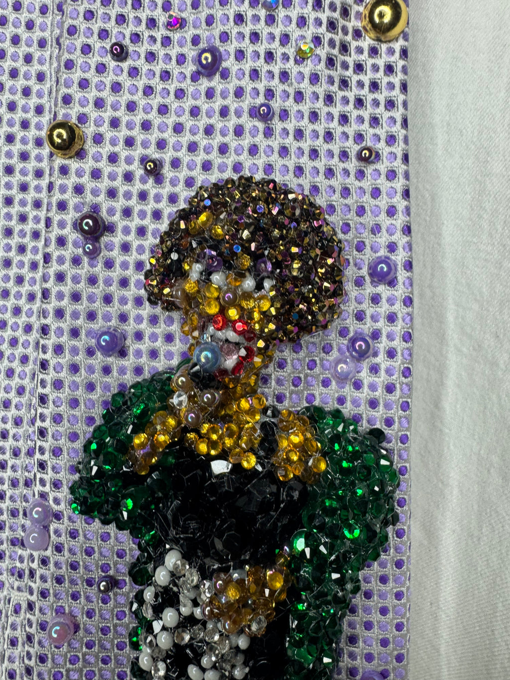 Purple Whitney Houston Performing In Black Floral Pants And Green Mink Coat Tie