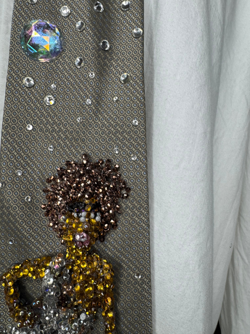 Brown Whitney Houston Posing on Clear Bench in Crystal Royalty Open Shoulder Dress For Photoshoot Tie