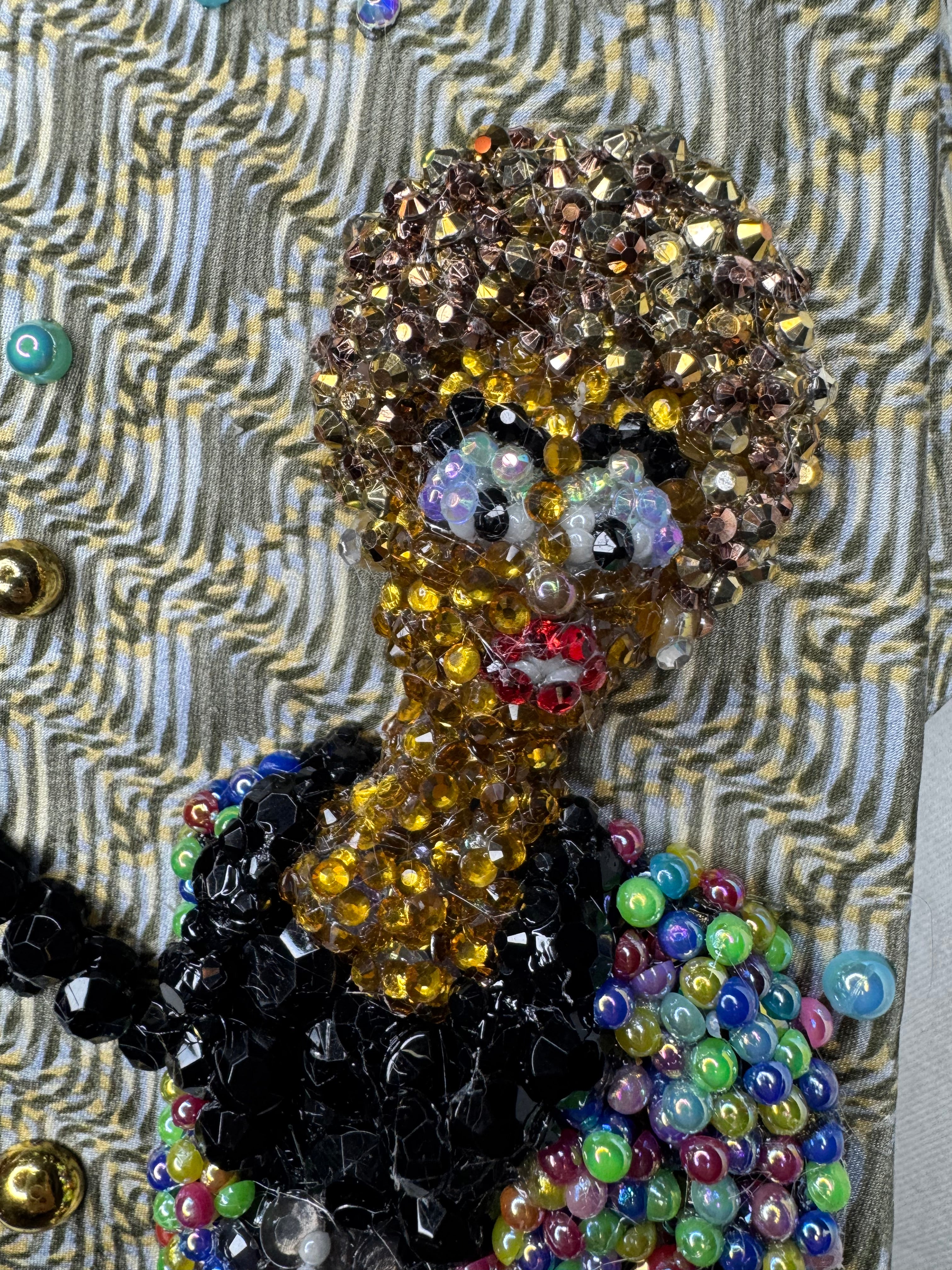 Beige Whitney Houston in Colorful Gem Jacket Posing on Staircase Tie