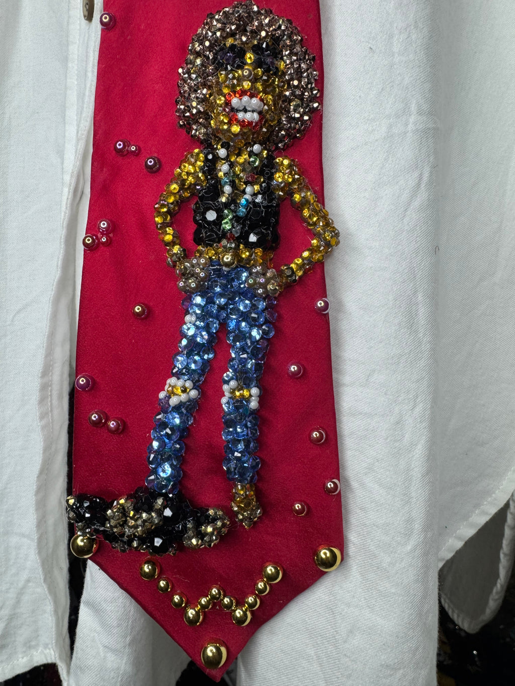 Red silk Whitney Houston with Hands Hip, Smiling with Jacket on Floor Photo shoot Tie
