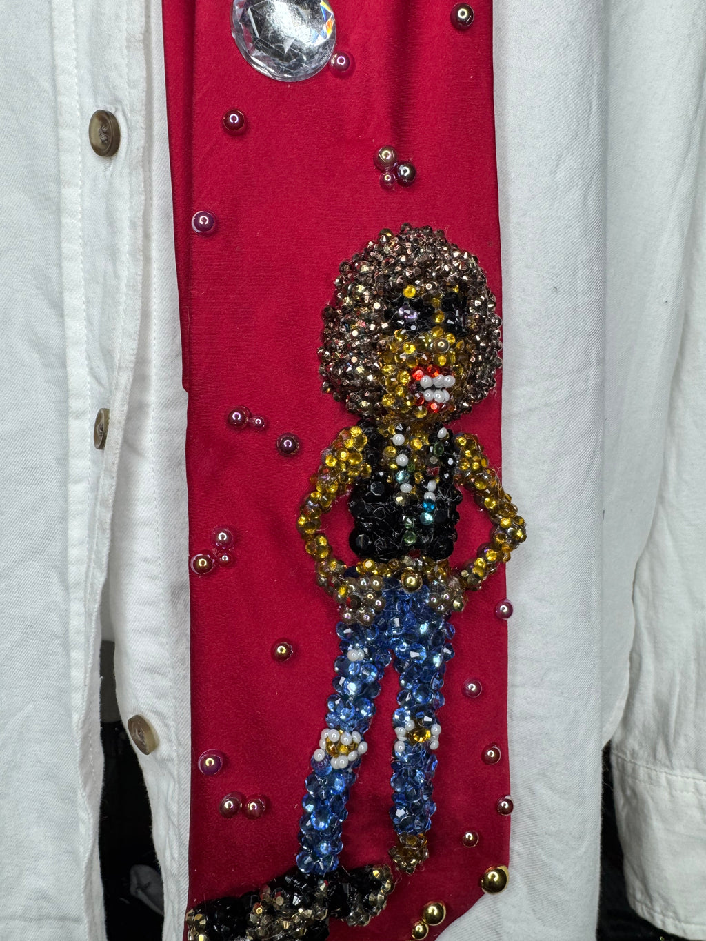 Red silk Whitney Houston with Hands Hip, Smiling with Jacket on Floor Photo shoot Tie
