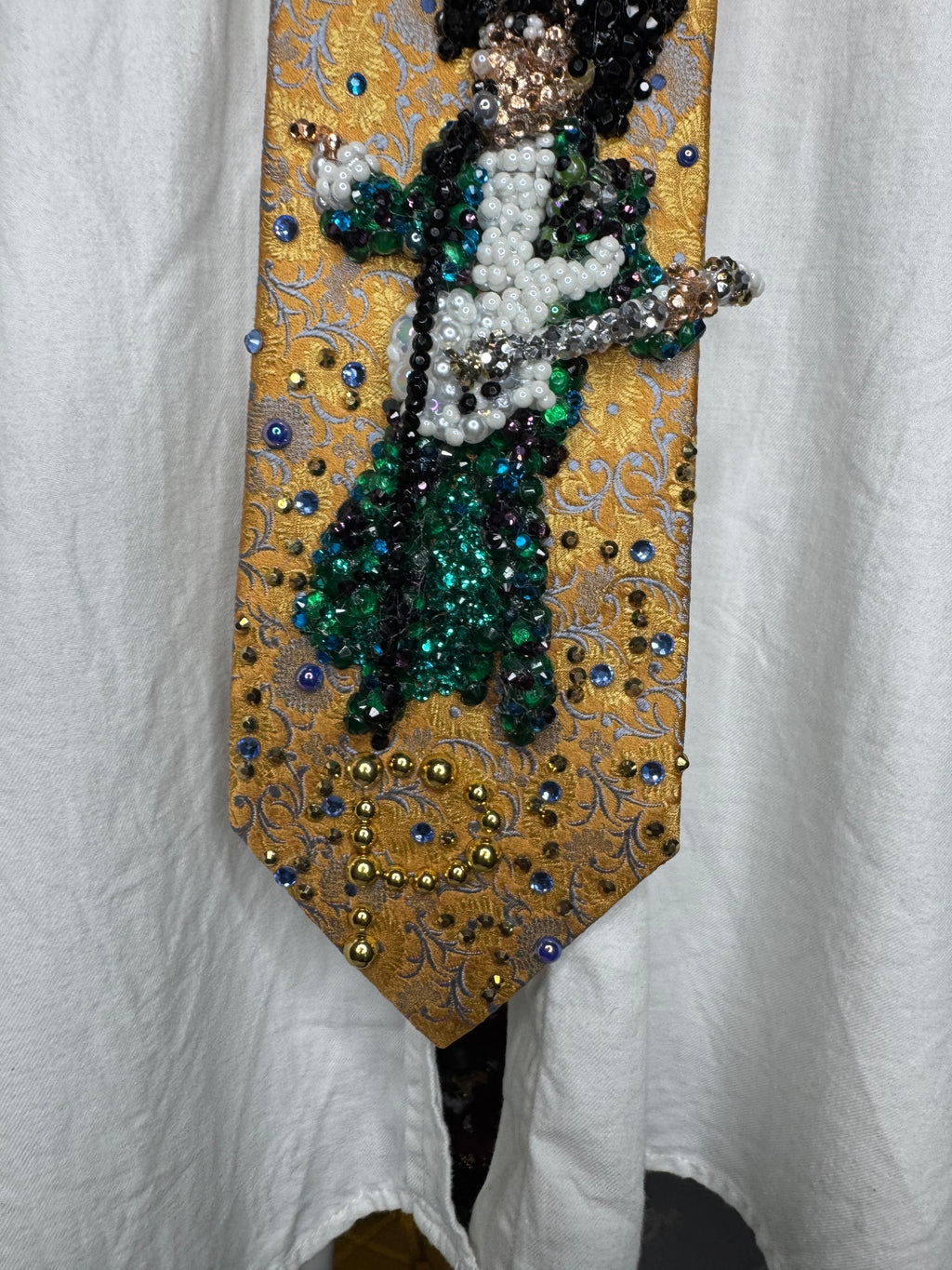 Gold Paisley Prince Pointing With White Guitar Performing Purple Rain at the AMA 1985 Tie