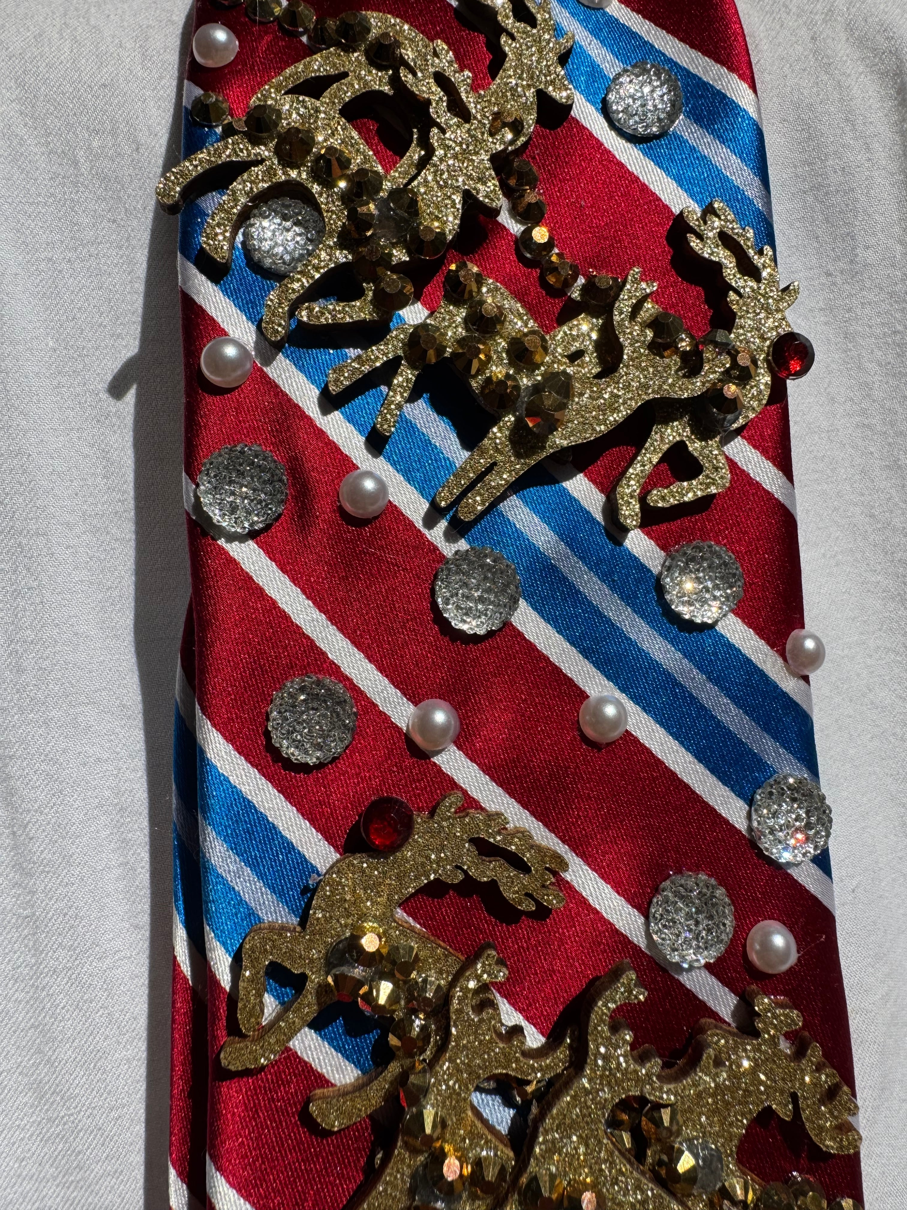 Red and Blue Striped Rudolf and the Reindeers Sleighing By Christmas Tie