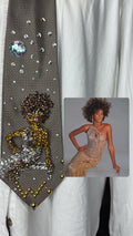 Brown Whitney Houston Posing on Clear Bench in Crystal Royalty Open Shoulder Dress For Photoshoot Tie