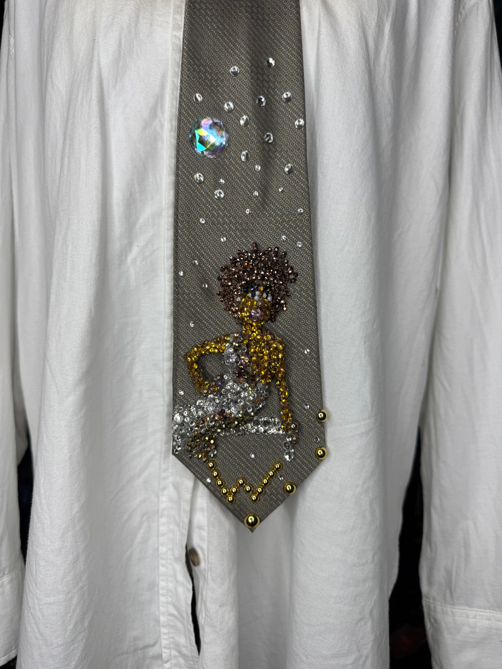 Brown Whitney Houston Posing on Clear Bench in Crystal Royalty Open Shoulder Dress For Photoshoot Tie