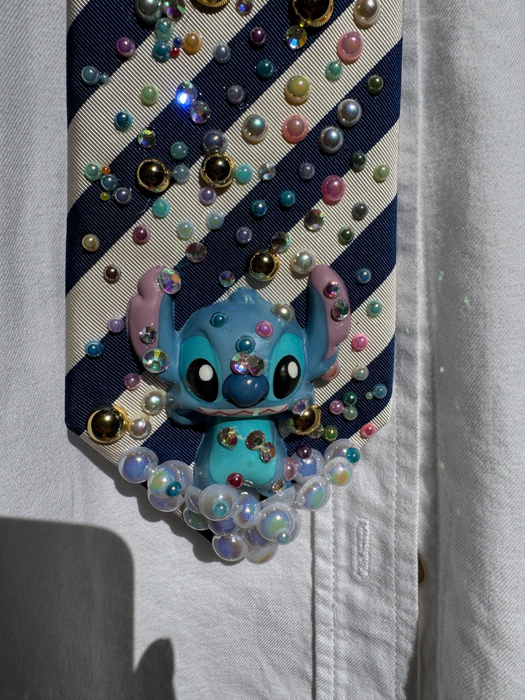 White and Blue Striped Stitch Under Cotton Candy Balls Treasure Box Spilling Movie Tie