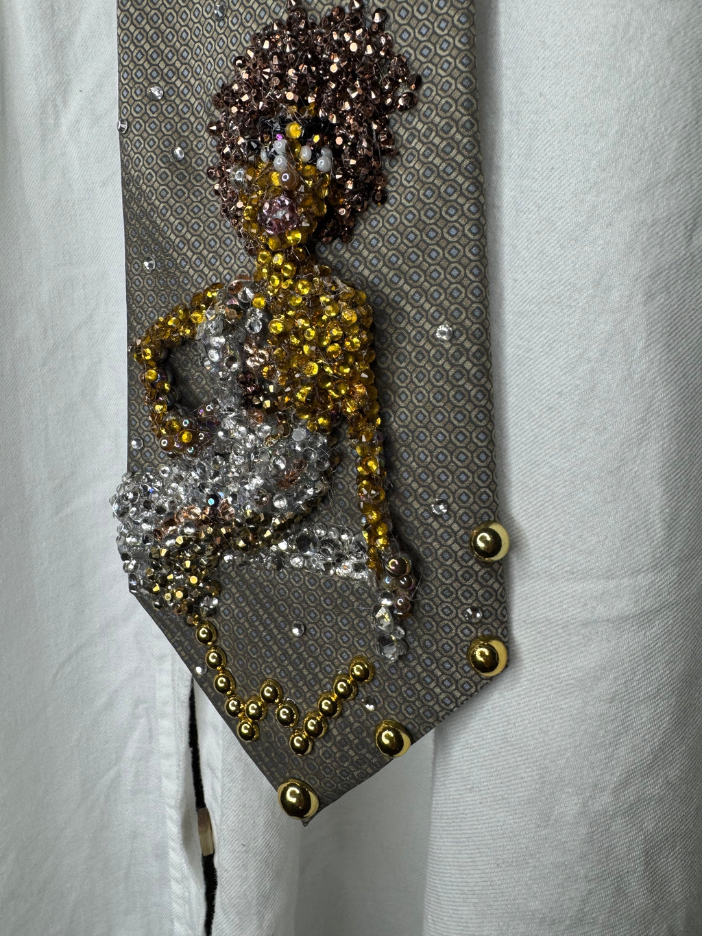 Brown Whitney Houston Posing on Clear Bench in Crystal Royalty Open Shoulder Dress For Photoshoot Tie