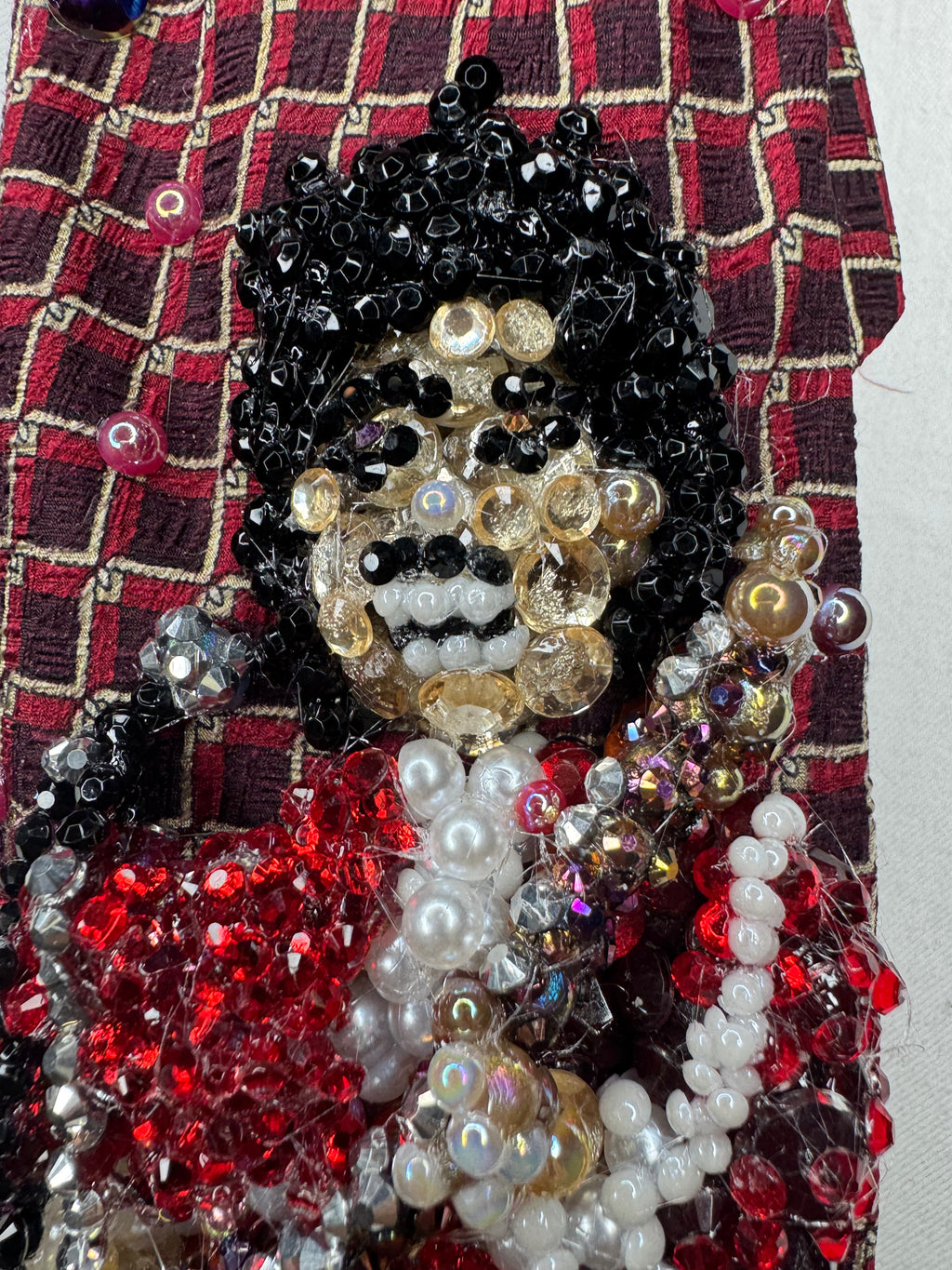 Red Prince Rocking Out in Red Outfit with Red Fuzzy Scarf on Brown Guitar Live Tie