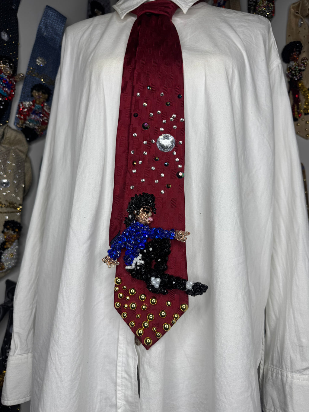 Red Michael Jackson Hitting Sitting and Pointing Crossed Legs Pose In TWYMMF Music Video Tie