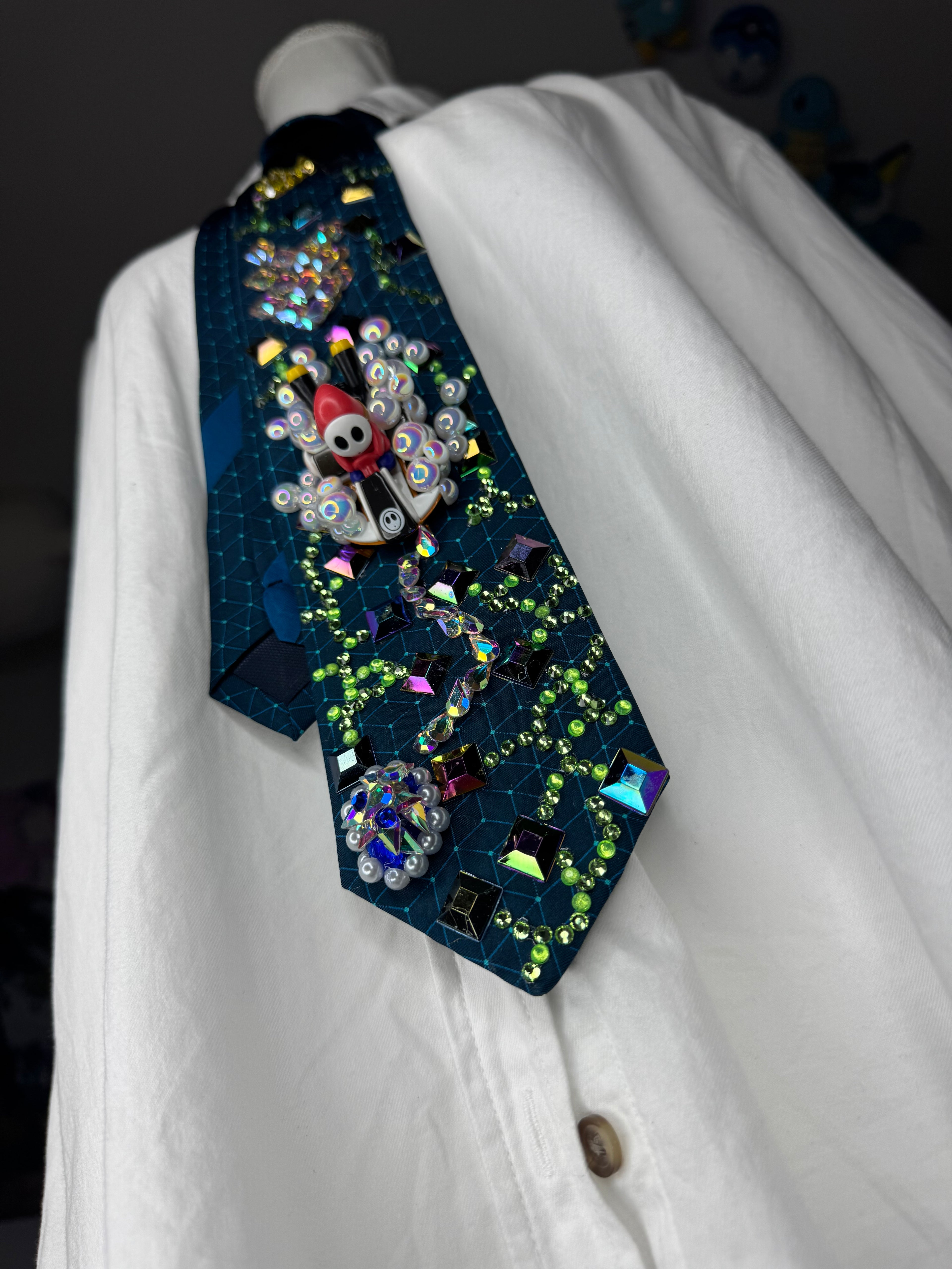 Dark Turquoise Shy Guy Throwing Blue Shell on Computer Chip Road 200cc Mario Kart Tie