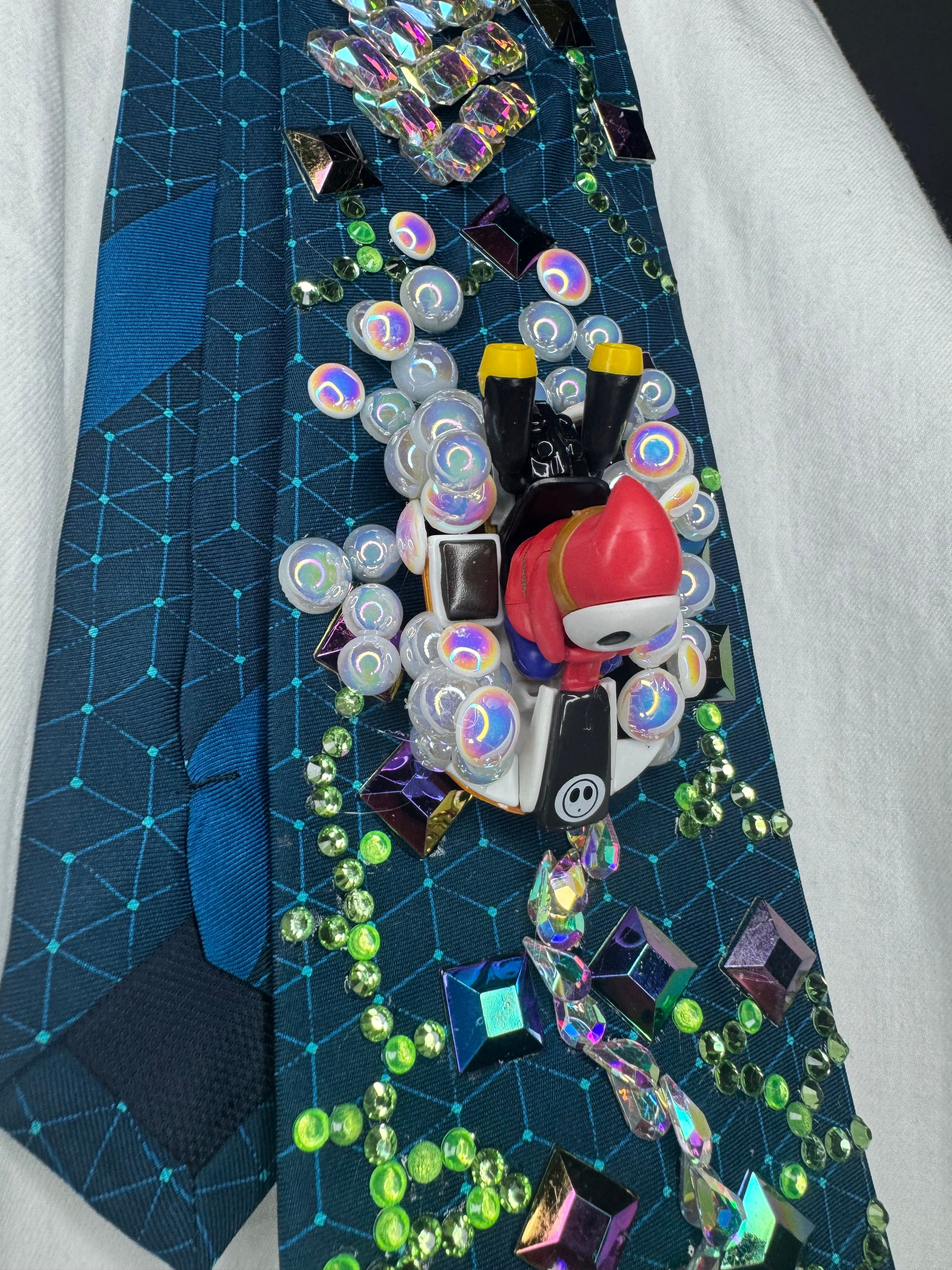 Dark Turquoise Shy Guy Throwing Blue Shell on Computer Chip Road 200cc Mario Kart Tie