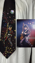 Marbled Prince Rocking Out In Colorful Black Royalty Outfit Tie