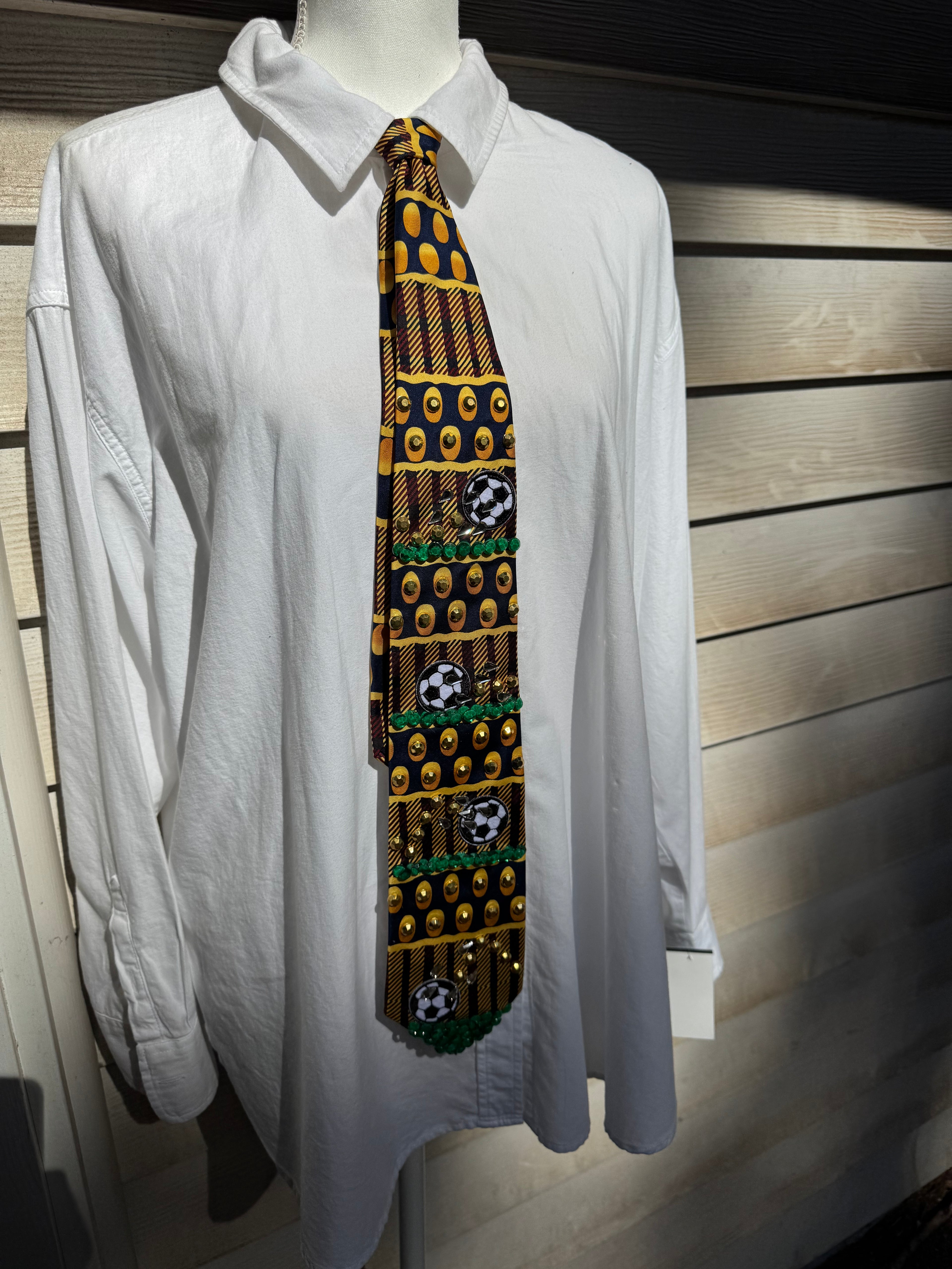 Gold and Burgundy Soccer Balls Moving Soccer Tie