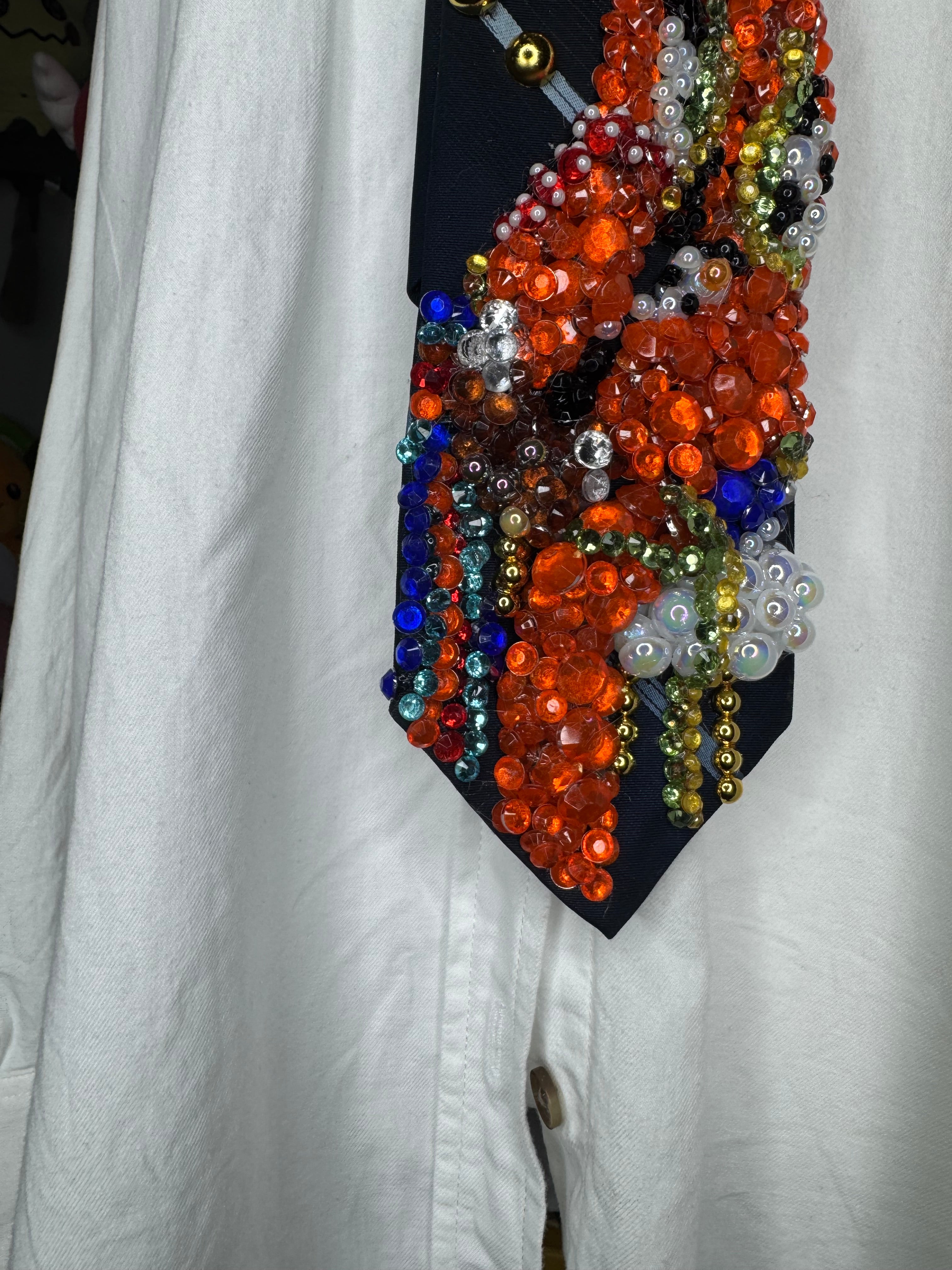 Navy Blue Young Michael Jackson In Orange and Floral Vest Outfit on White Chair 1972 Tie