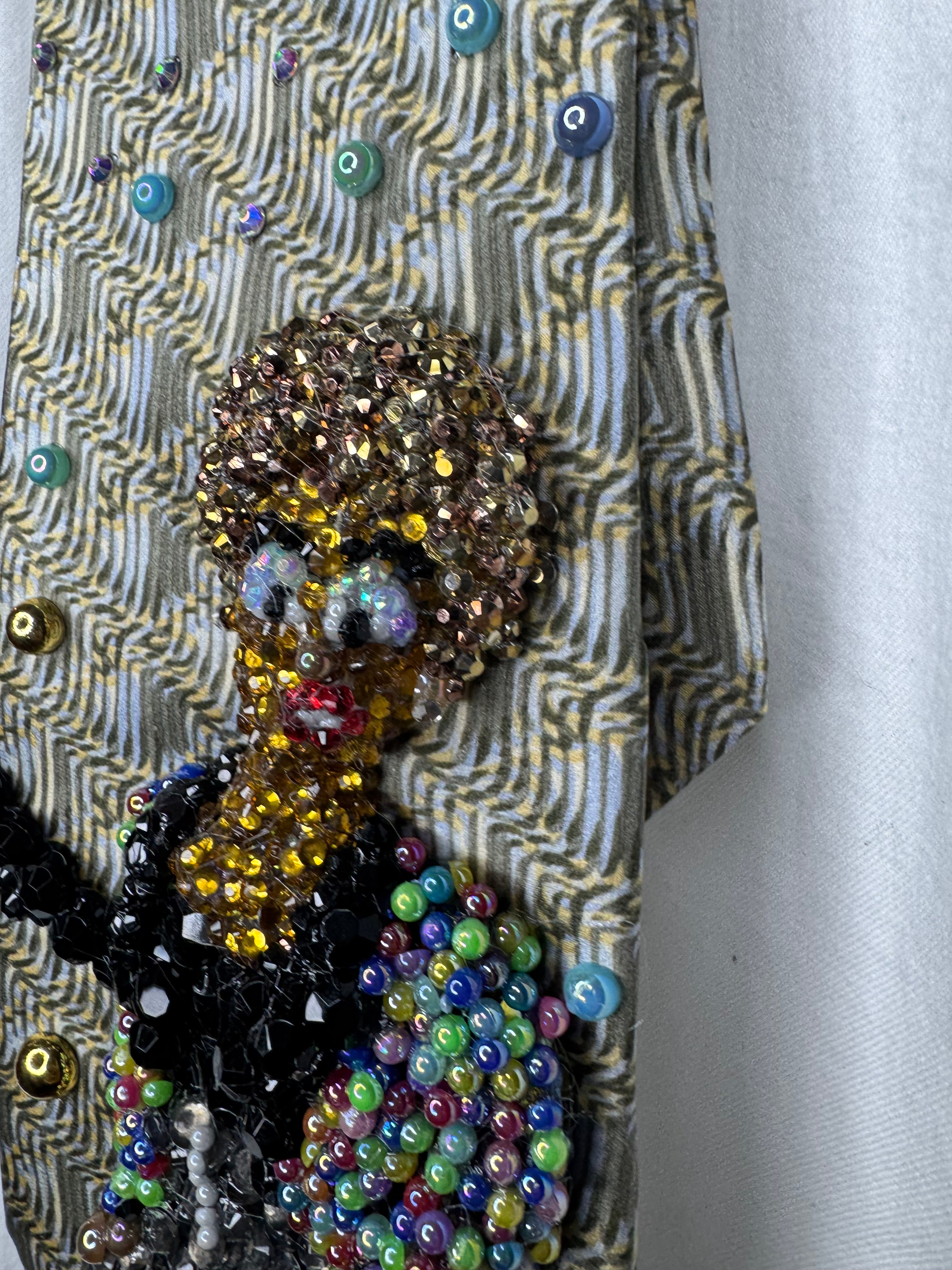 Beige Whitney Houston in Colorful Gem Jacket Posing on Staircase Tie