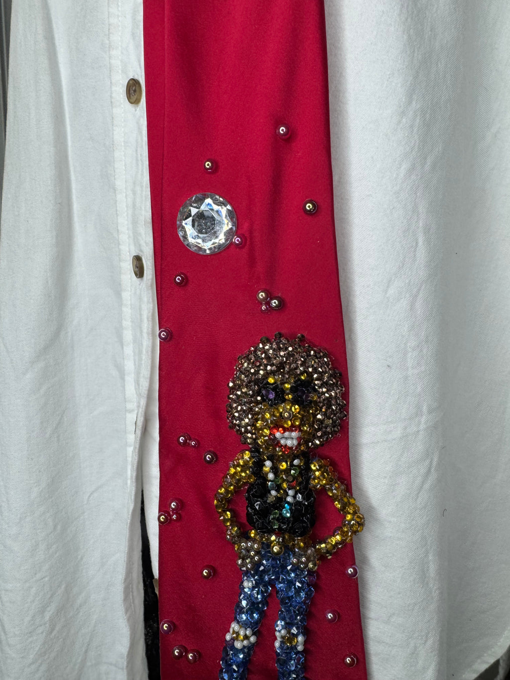 Red silk Whitney Houston with Hands Hip, Smiling with Jacket on Floor Photo shoot Tie