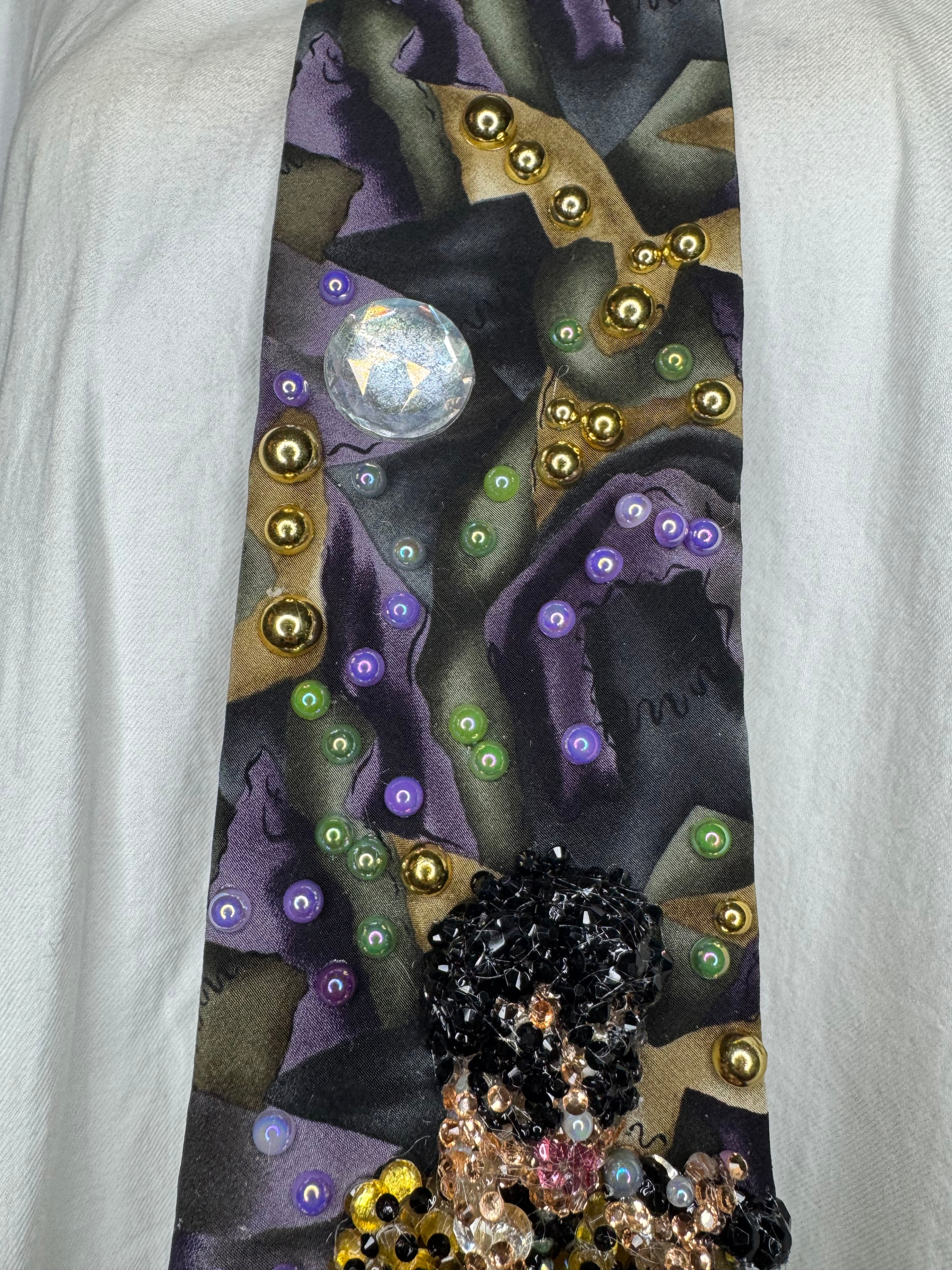 Purple Gold, and Green Marbled Prince in Full Yellow Polka Dot Suit Playing on Orange Cheetah Print Piano Live Tie