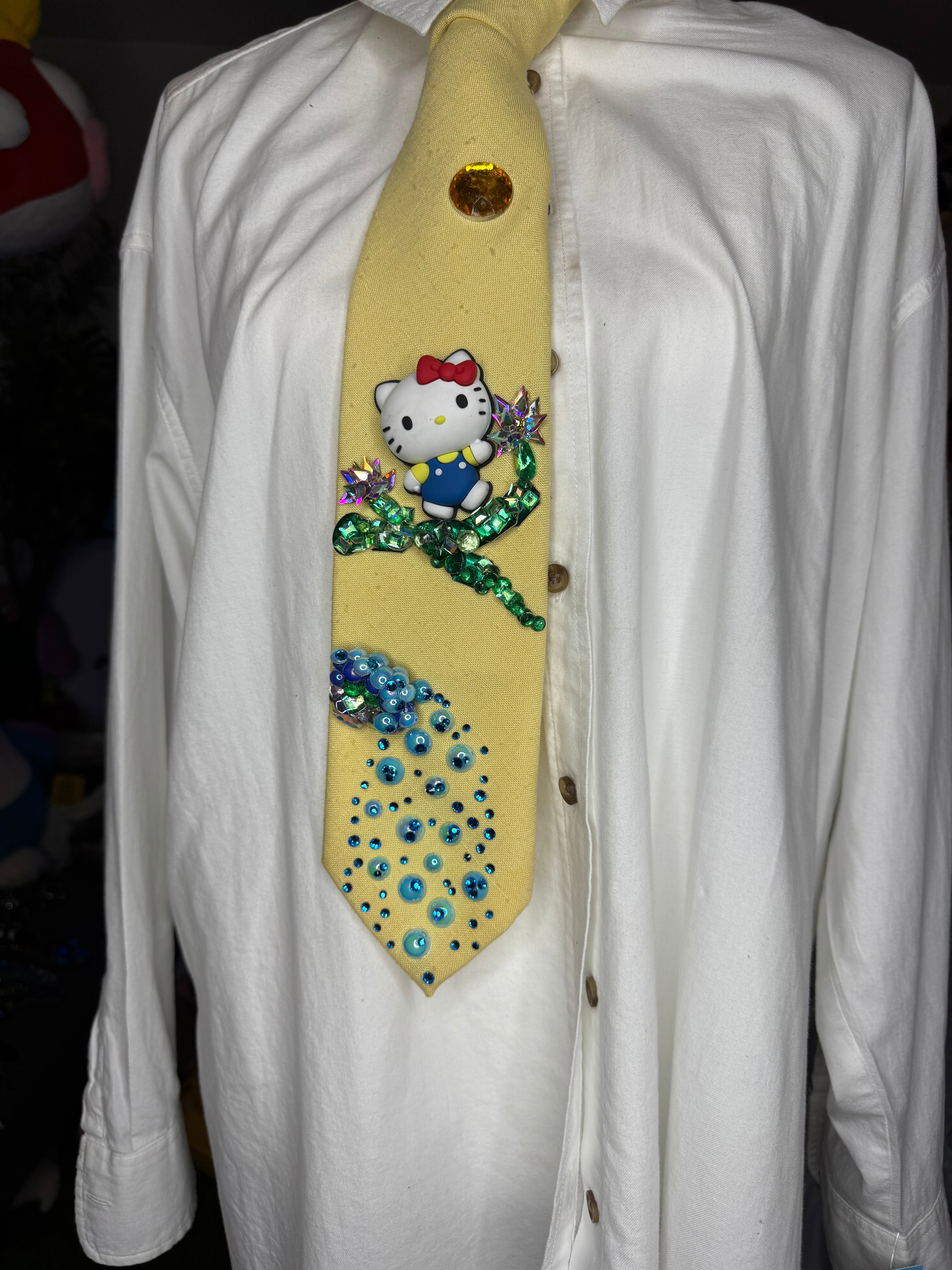 Yellow Hello Kitty Near Waterfall Anime Tie