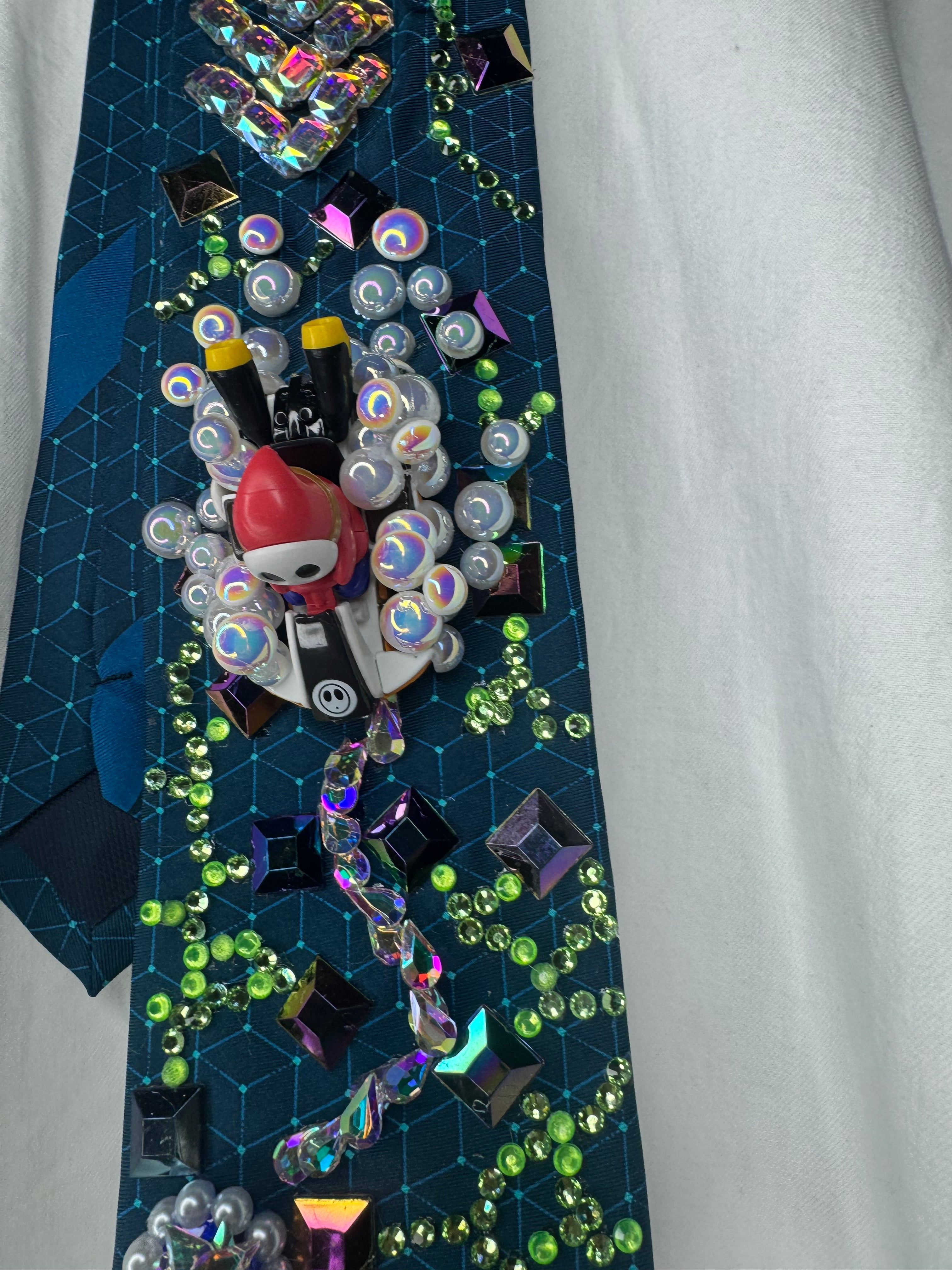 Dark Turquoise Shy Guy Throwing Blue Shell on Computer Chip Road 200cc Mario Kart Tie