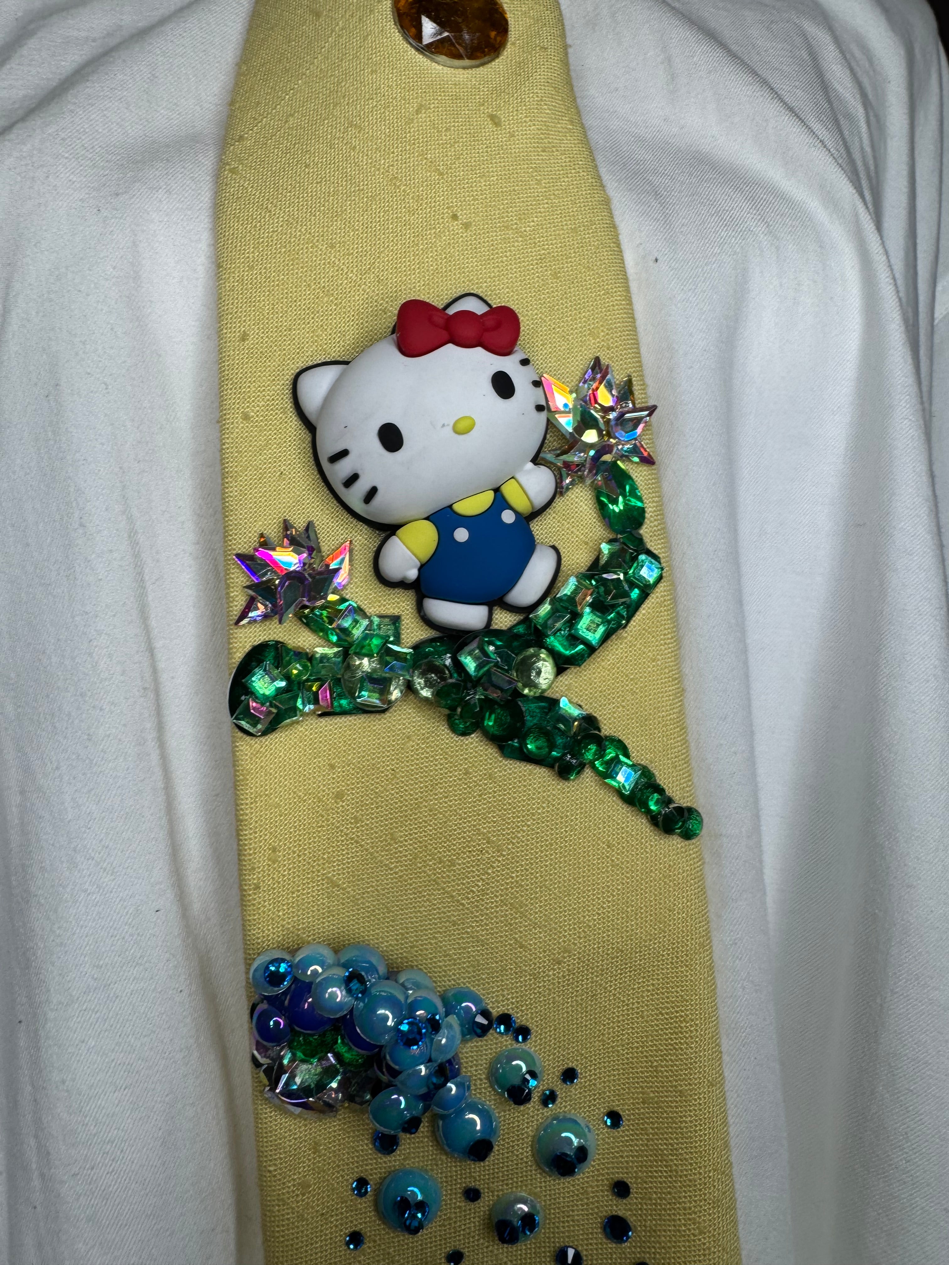Yellow Hello Kitty Near Waterfall Anime Tie