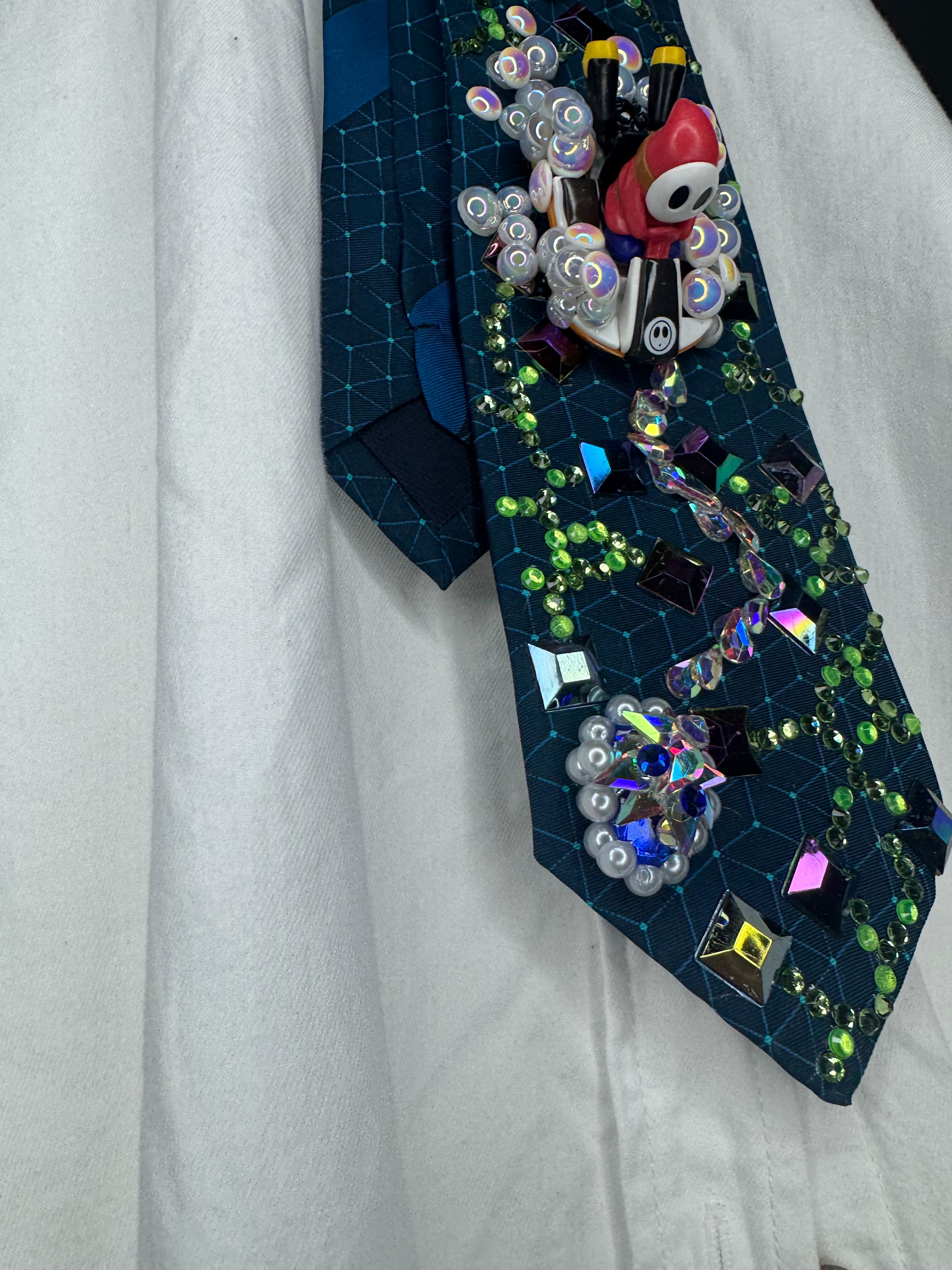 Dark Turquoise Shy Guy Throwing Blue Shell on Computer Chip Road 200cc Mario Kart Tie