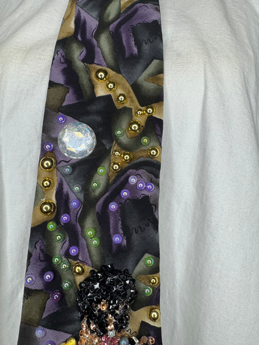 Purple Gold, and Green Marbled Prince in Full Yellow Polka Dot Suit Playing on Orange Cheetah Print Piano Live Tie