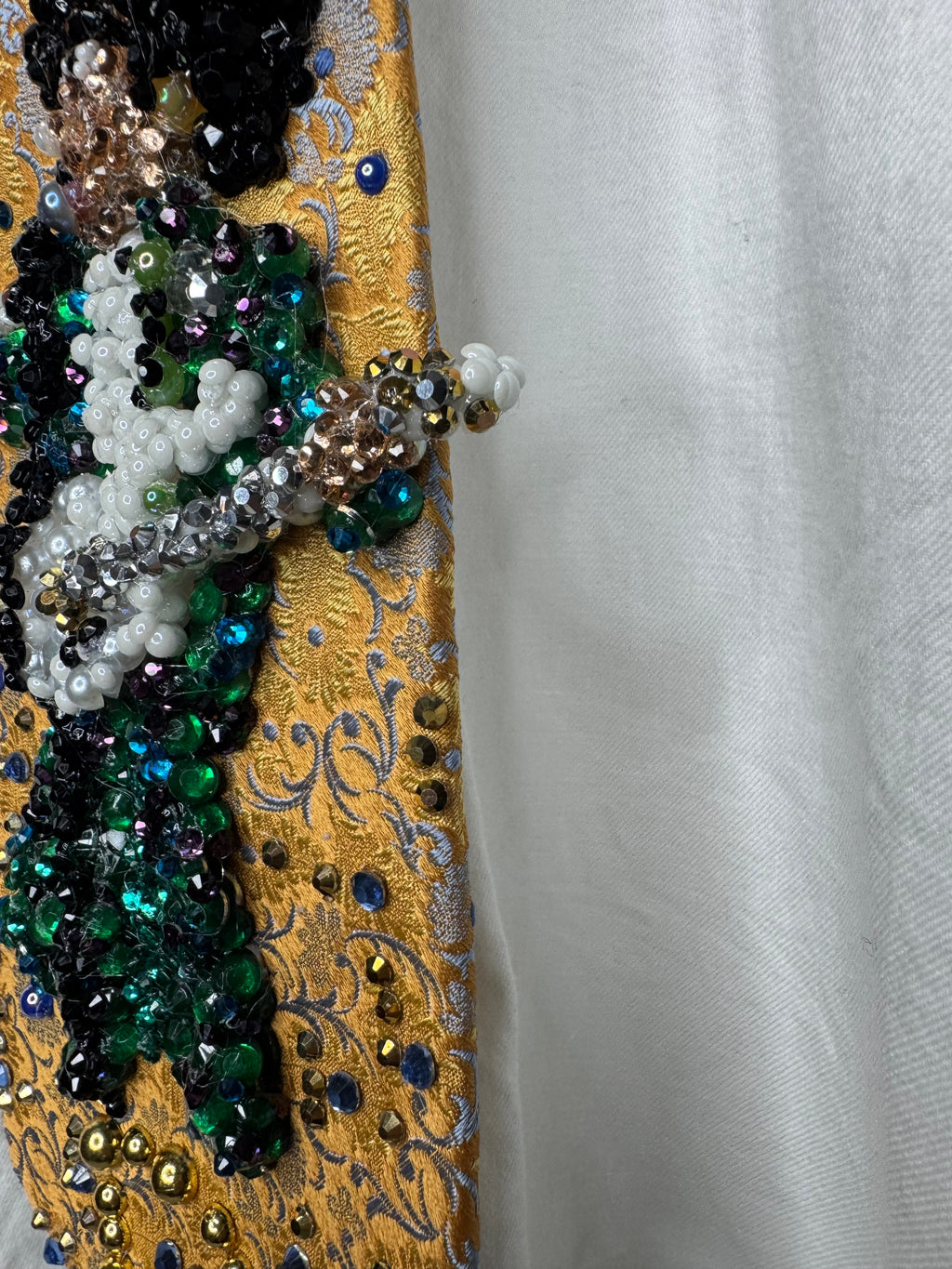 Gold Paisley Prince Pointing With White Guitar Performing Purple Rain at the AMA 1985 Tie
