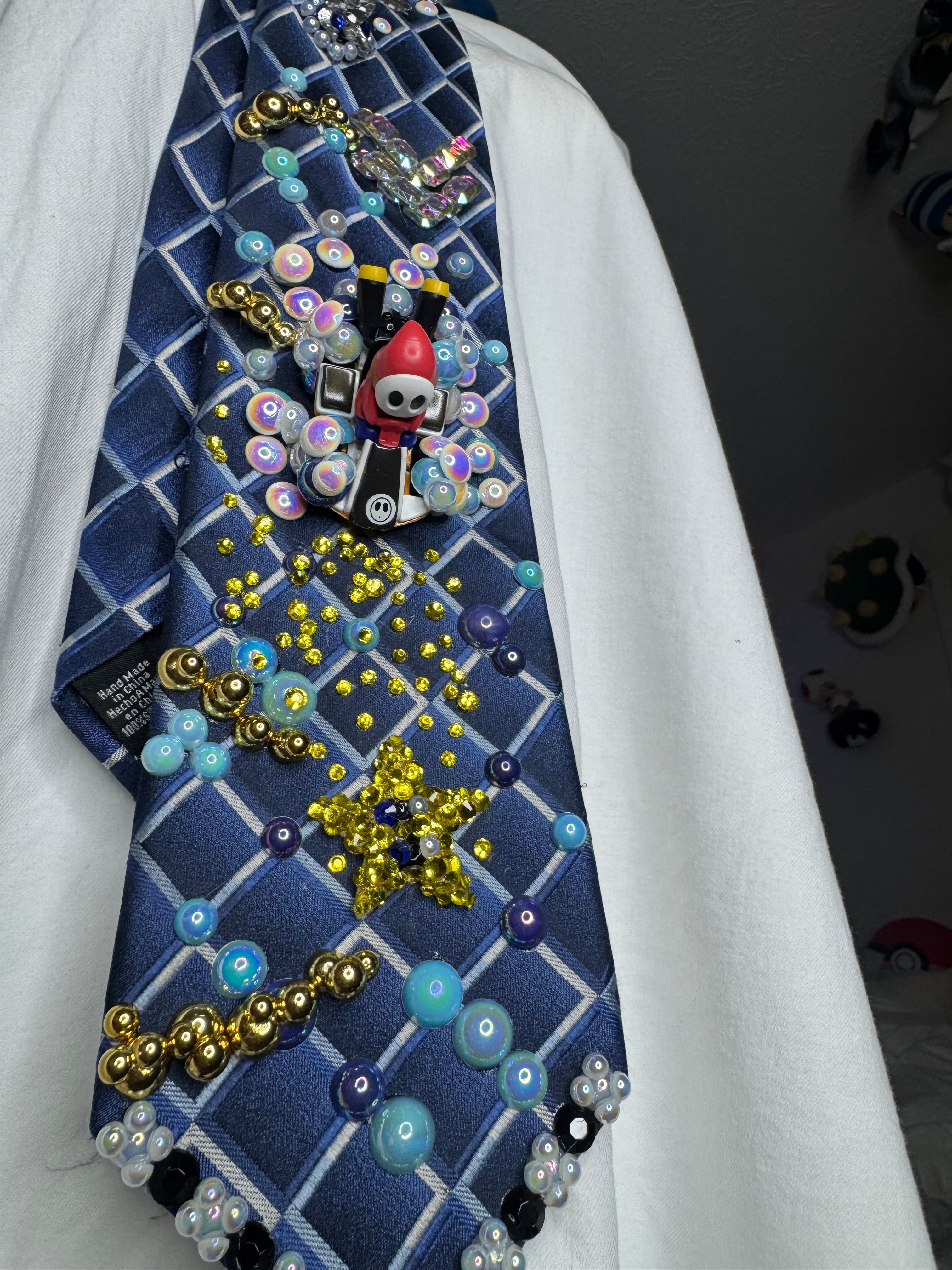 Navy Blue Shy Guy Chasing Star Item Underwater on Golden Coral Reef Road 200cc Mario Kart Tie