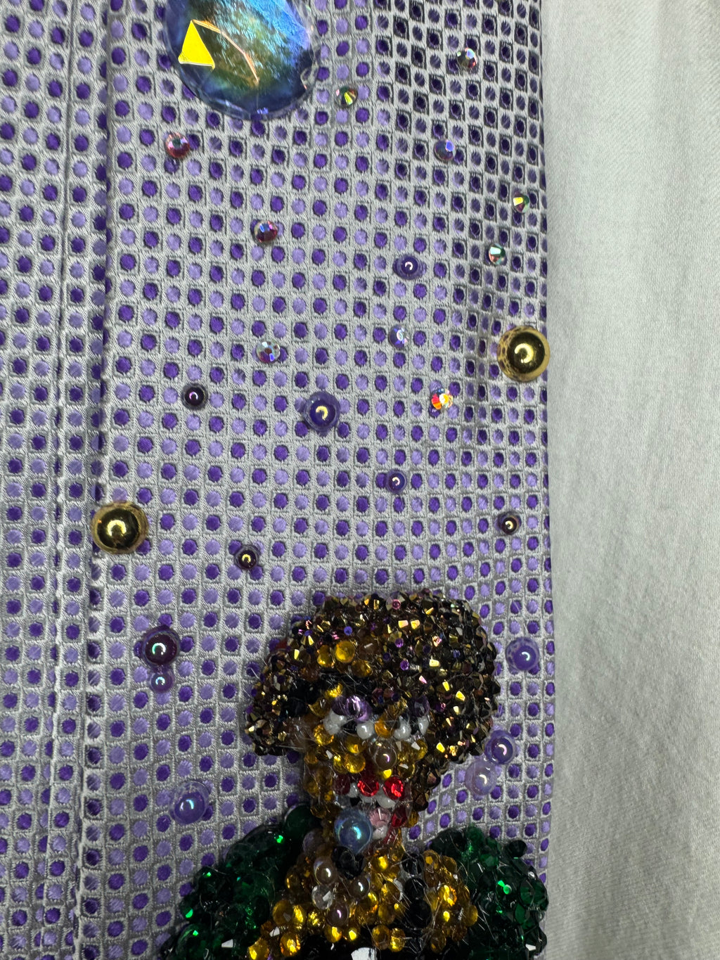 Purple Whitney Houston Performing In Black Floral Pants And Green Mink Coat Tie