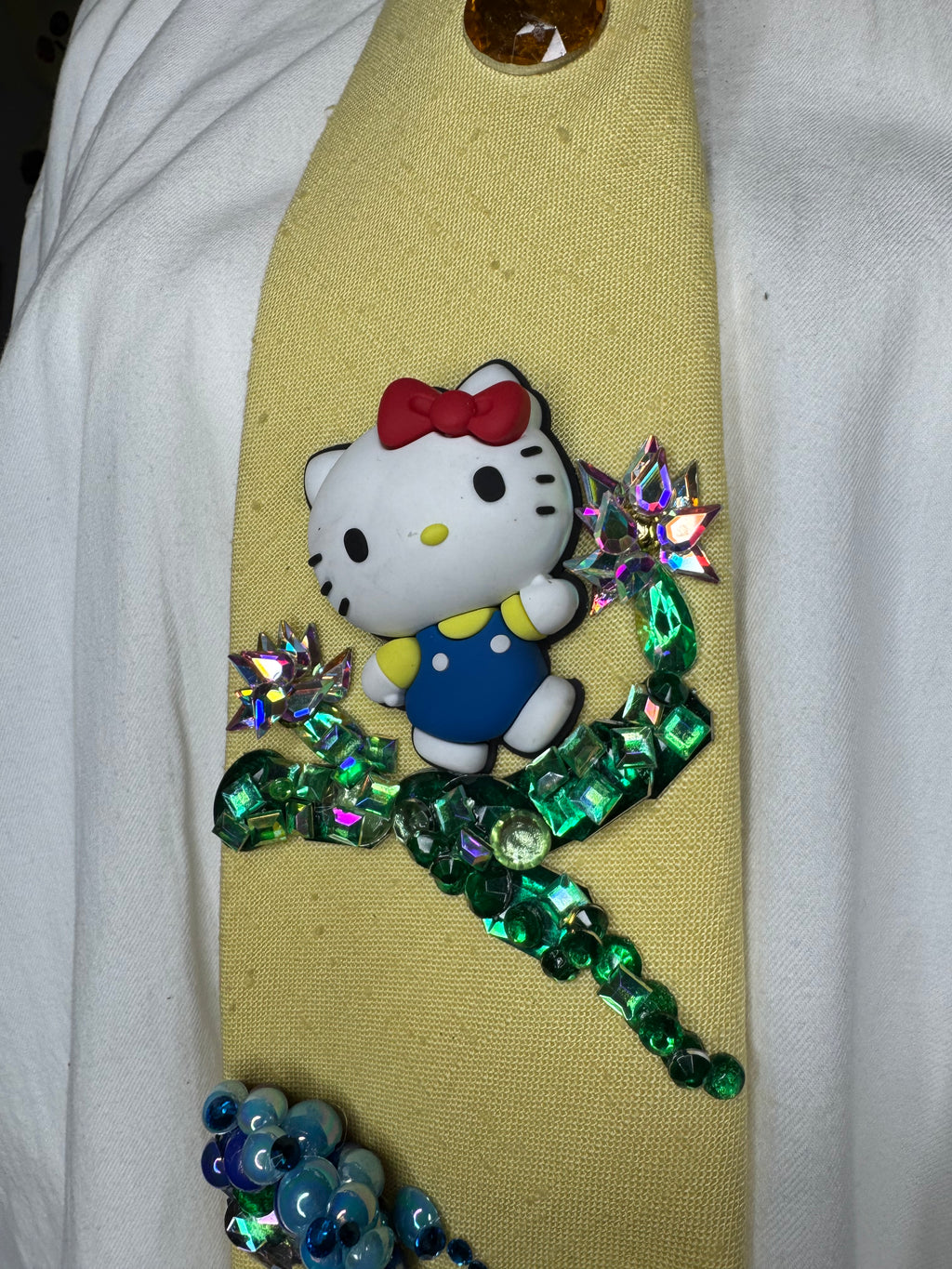Yellow Hello Kitty Near Waterfall Anime Tie